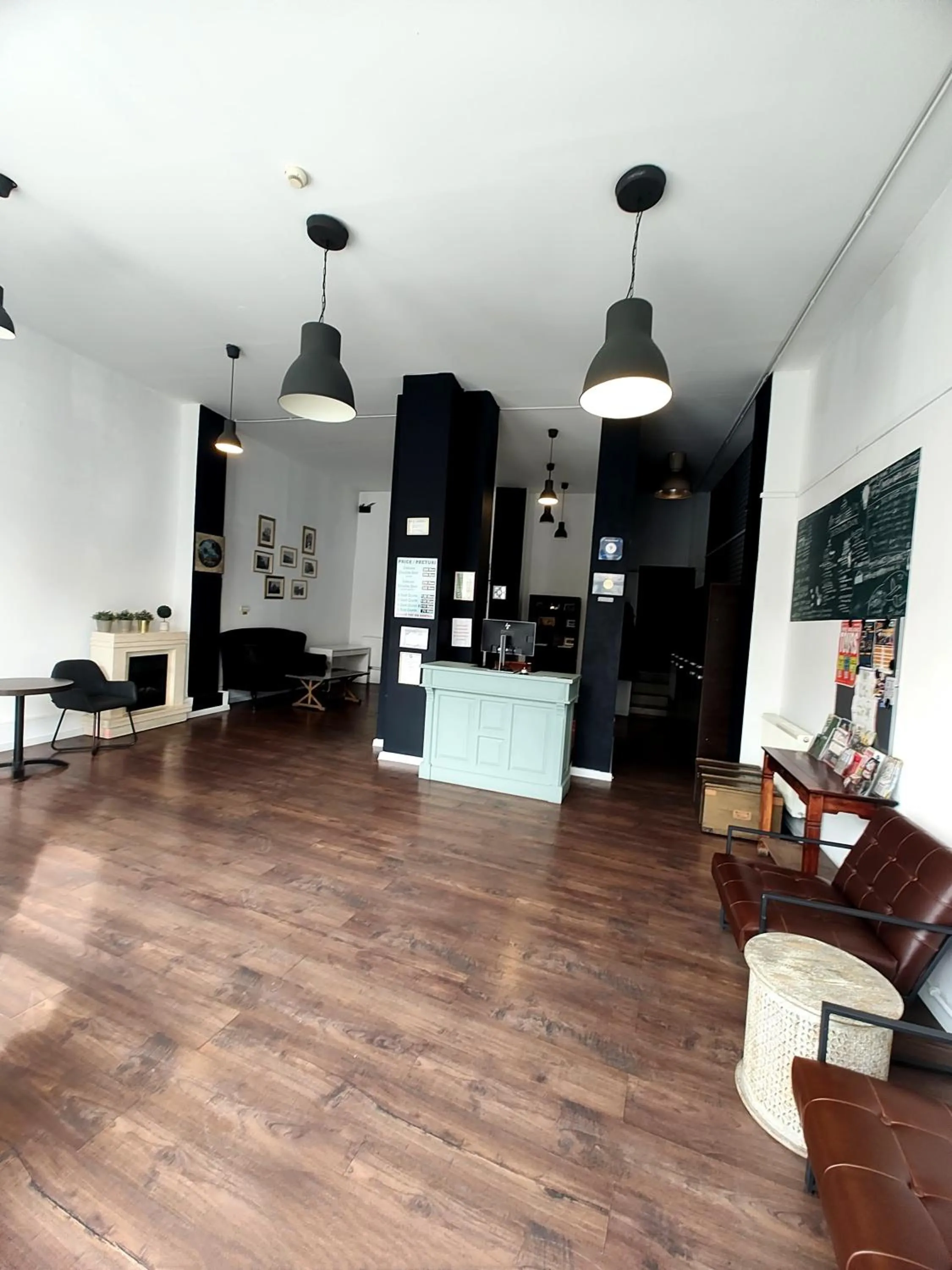 Communal lounge/ TV room in Antique Hostel