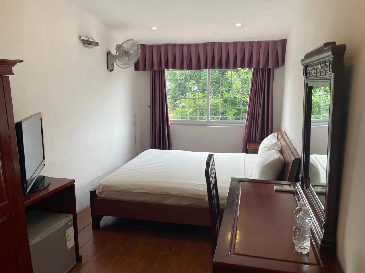 Bed in Bonjour Hanoi Hotel & Travel