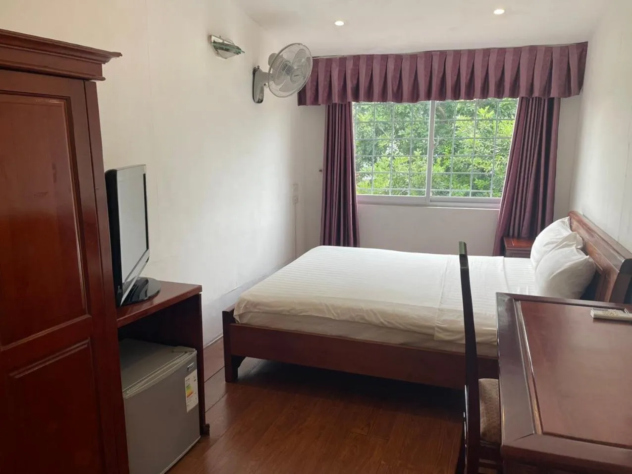 Bed in Bonjour Hanoi Hotel & Travel