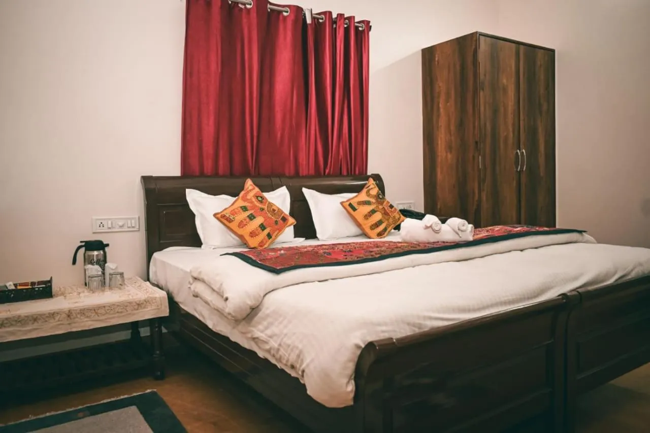 Bed in Hotel Sanjay Villas