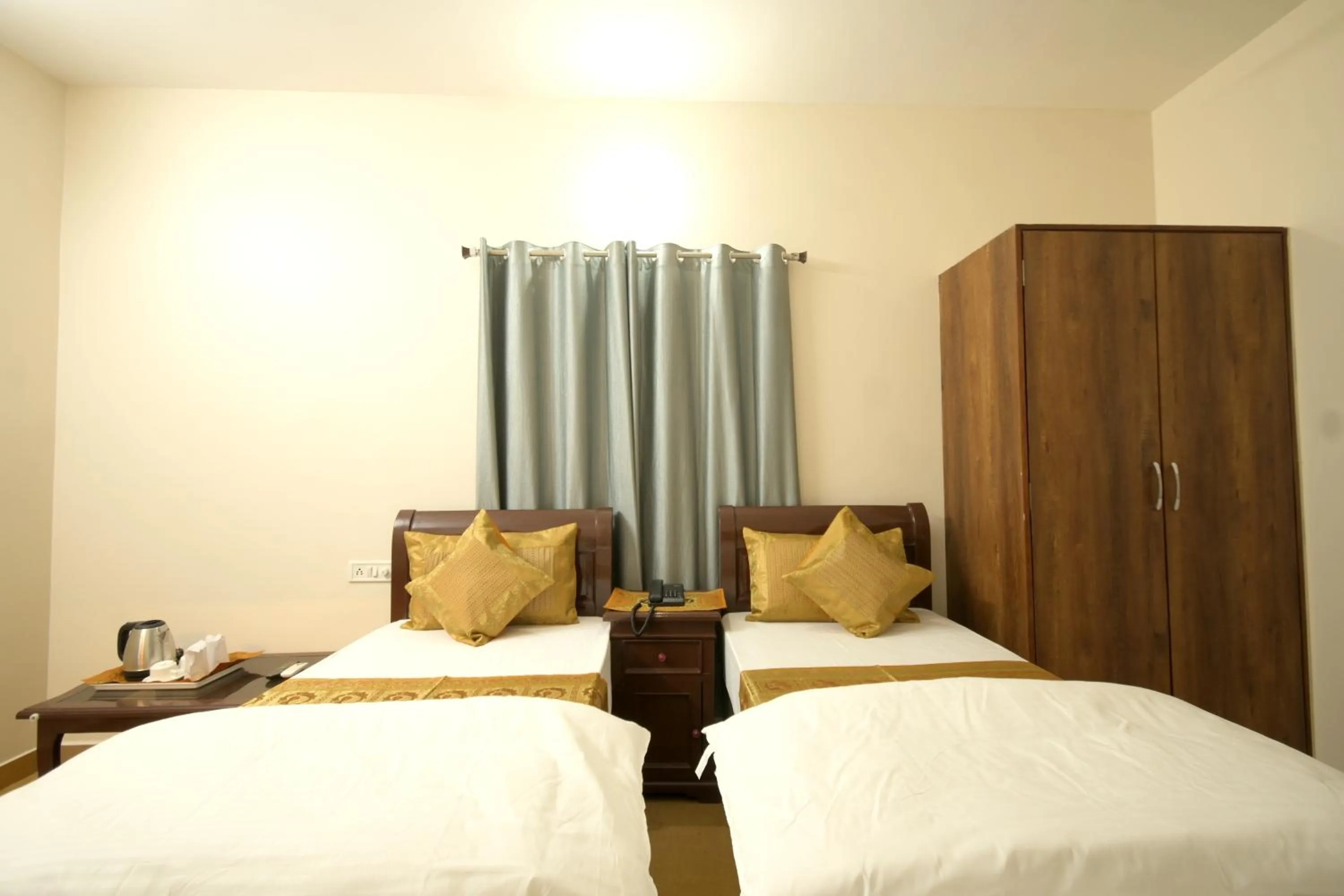 Bed in Hotel Sanjay Villas