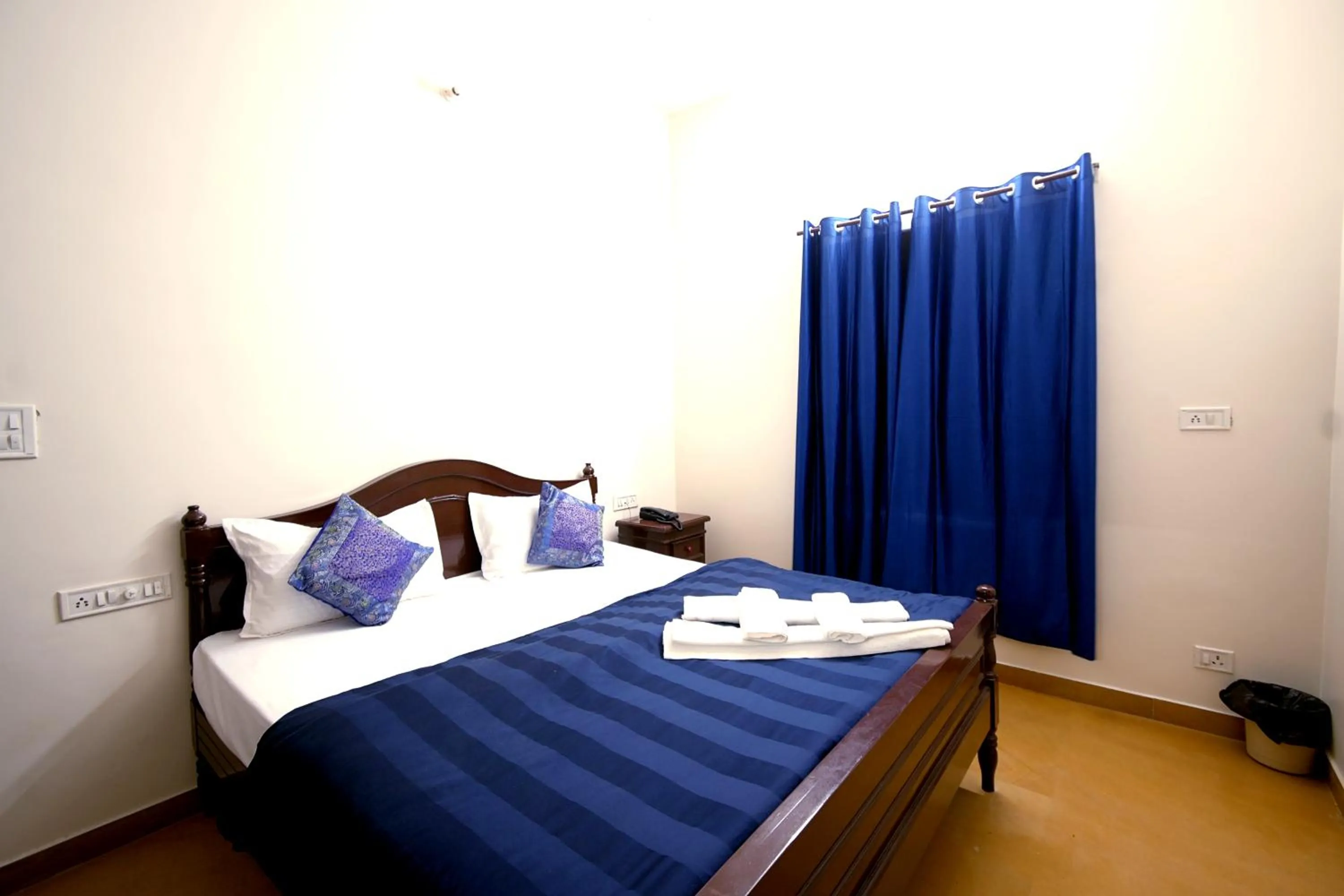 Bed in Hotel Sanjay Villas