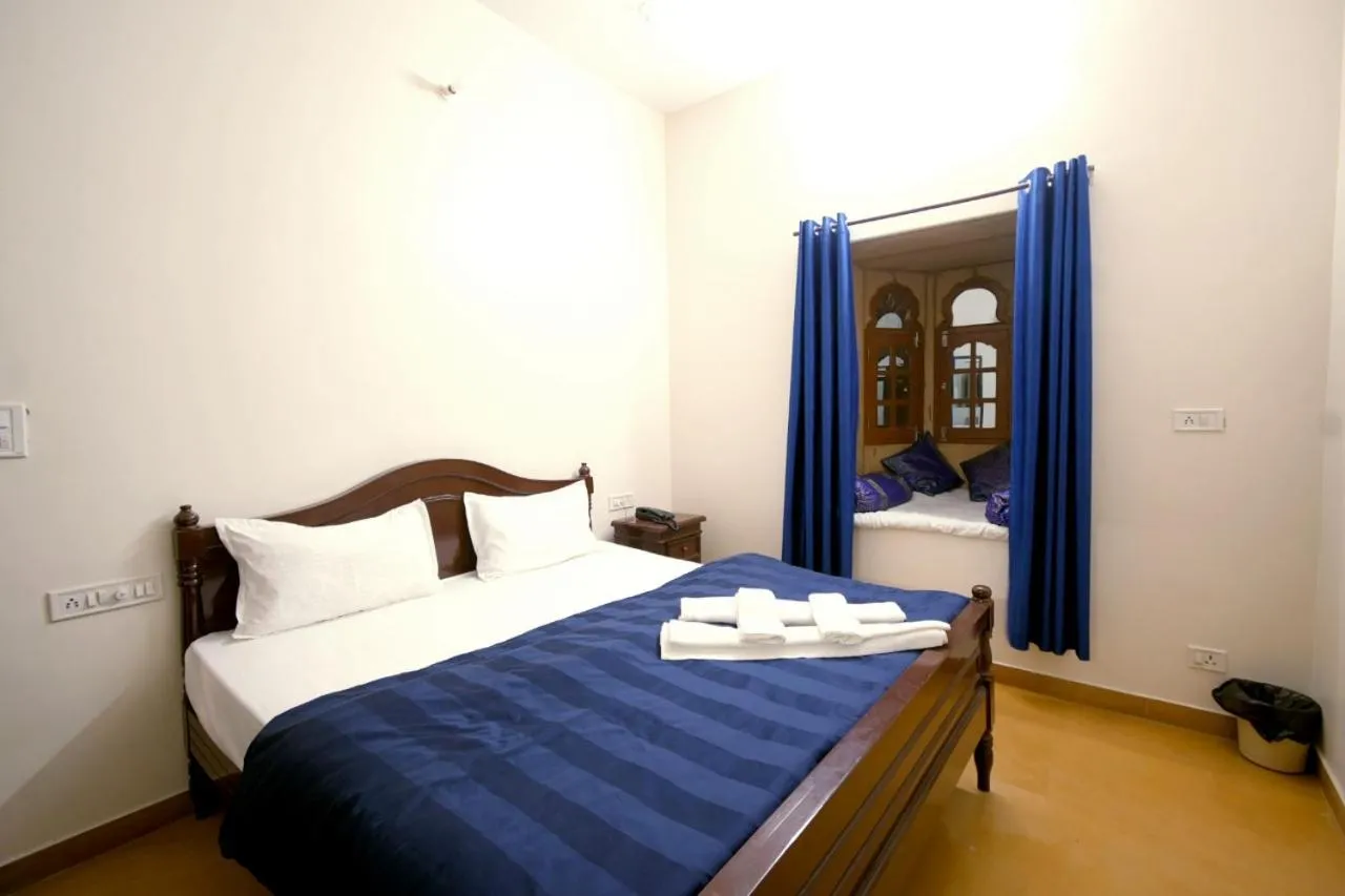 Bed in Hotel Sanjay Villas