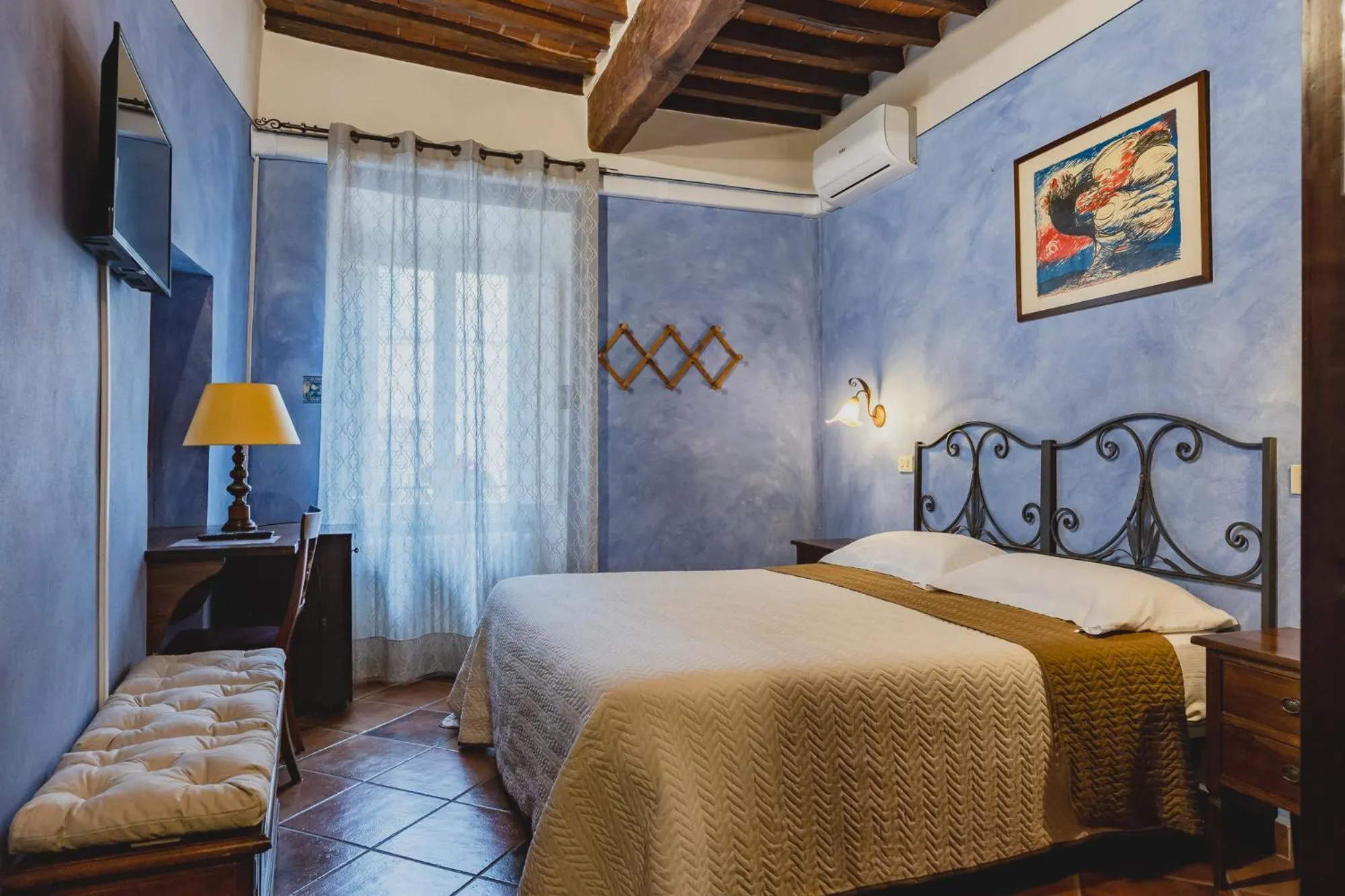 Photo of the whole room, Bed in Meublè Evoè