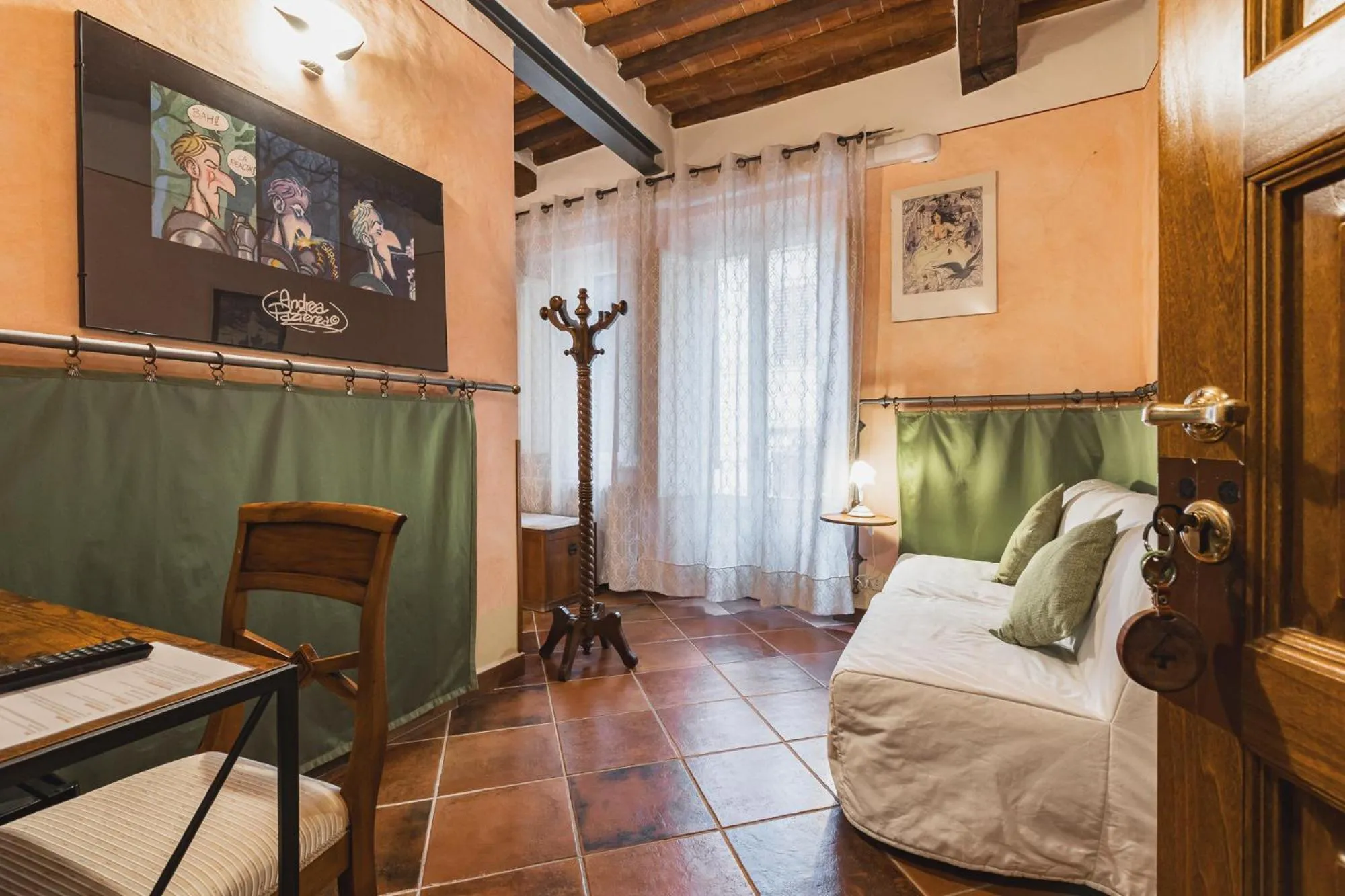 Photo of the whole room, Bed in Meublè Evoè