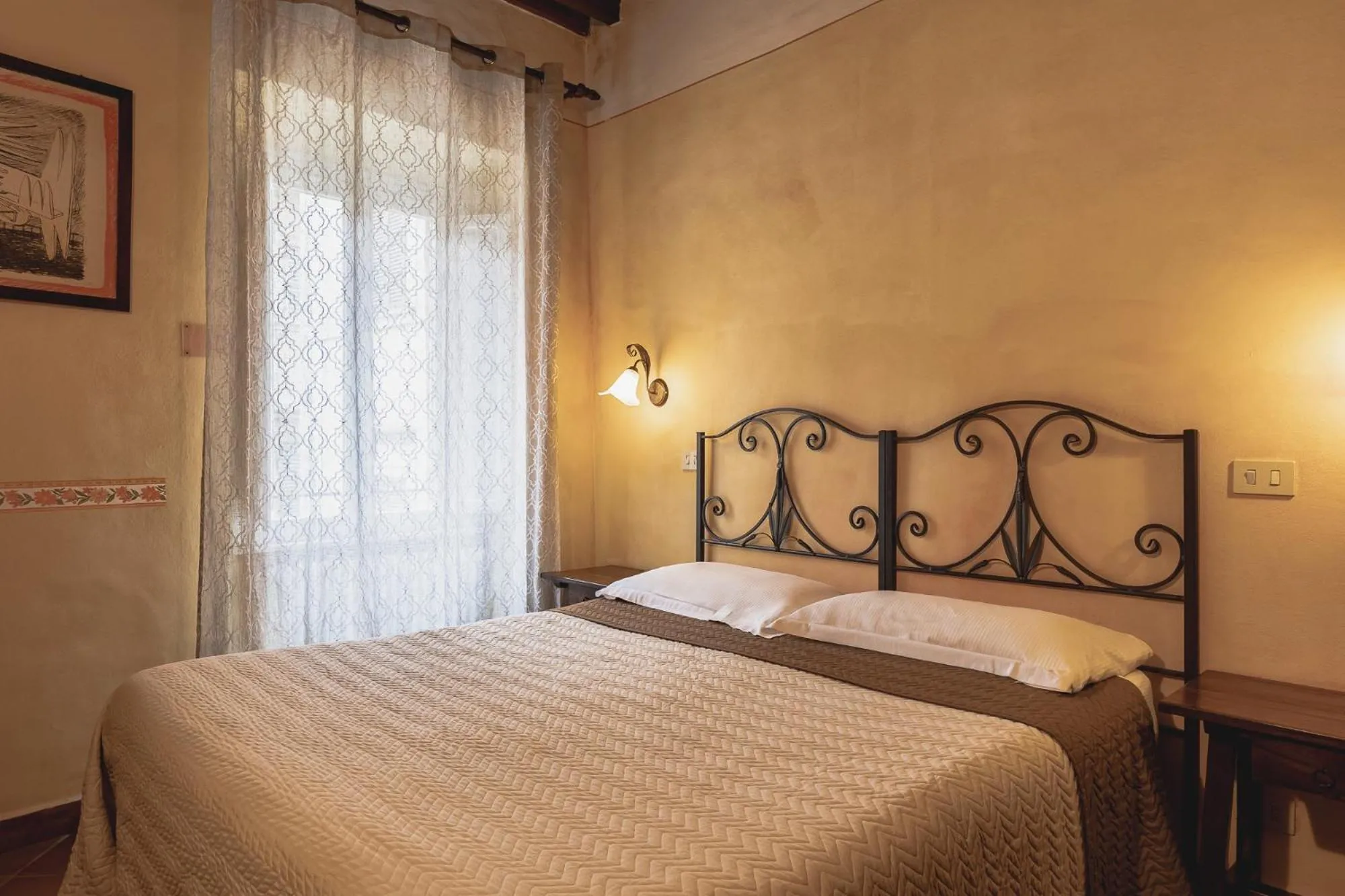 Bed in Meublè Evoè