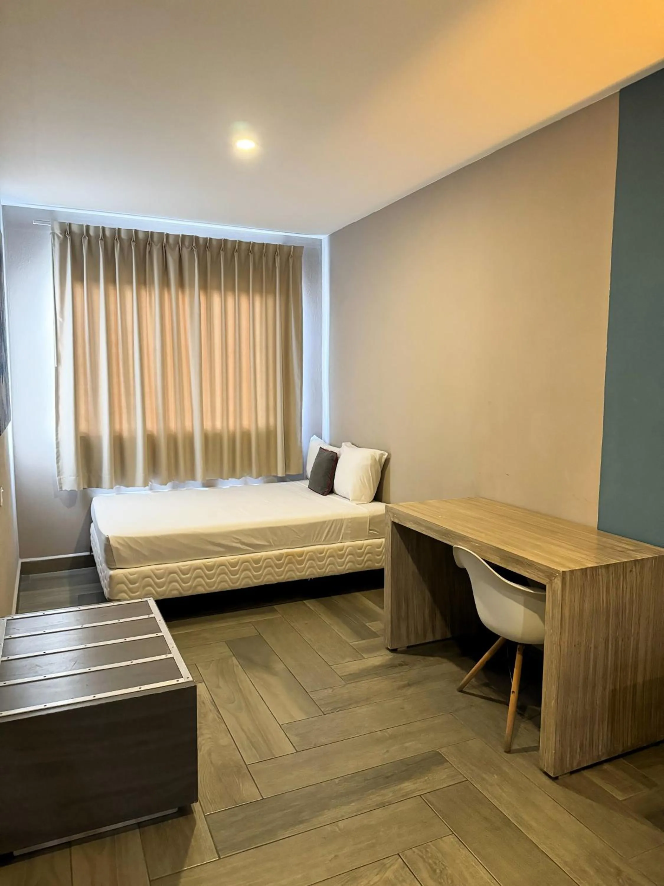 Seating area, Bed in Illusion Xpress I Attraction Hotel Deluxe