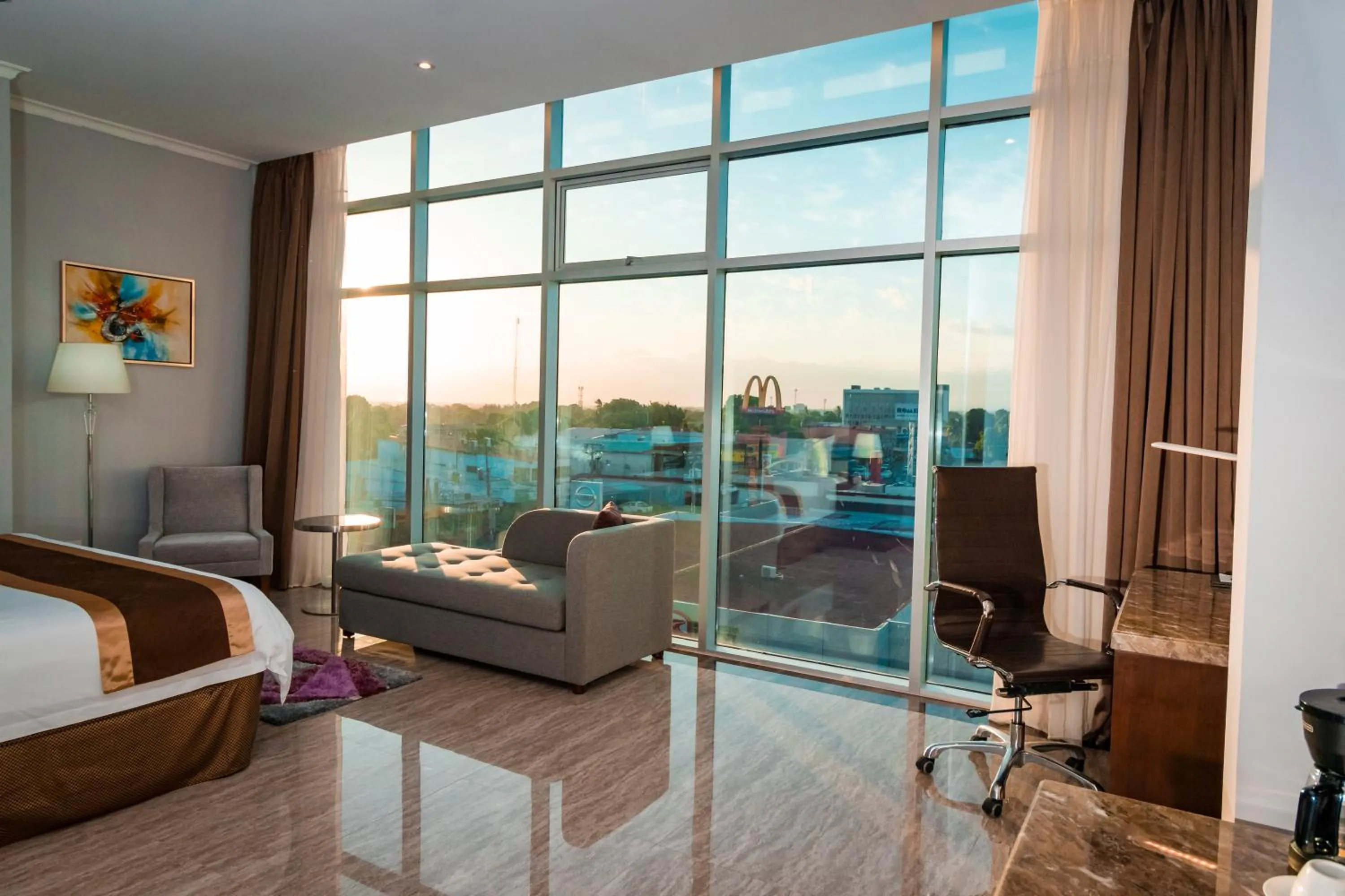 Bed in Hotel City Plaza & Suites