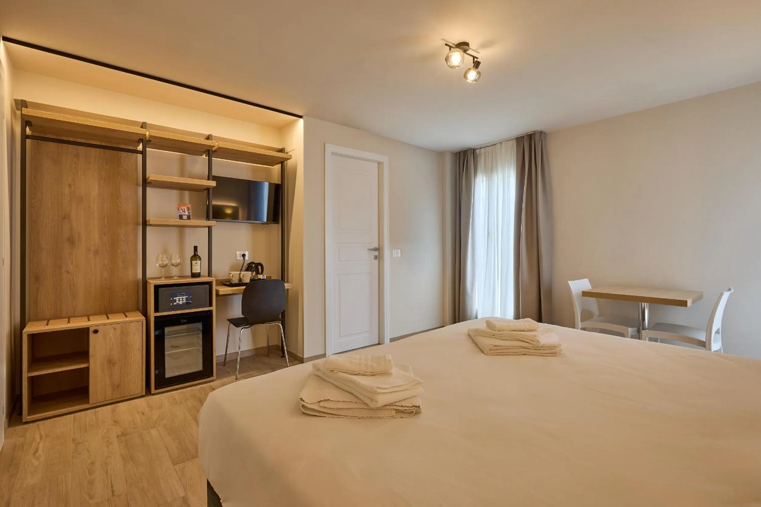 Photo of the whole room, Bed in Relais Tiburtina