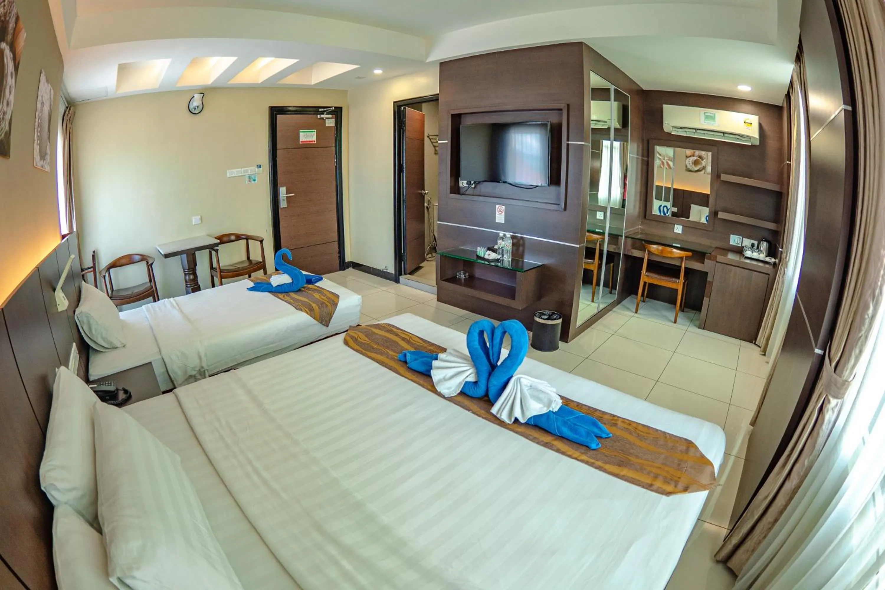 Bed in Wave View Hotel