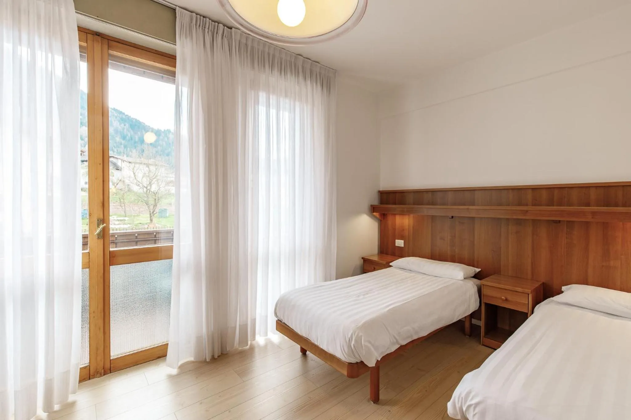 Bed in Albergo Belvedere