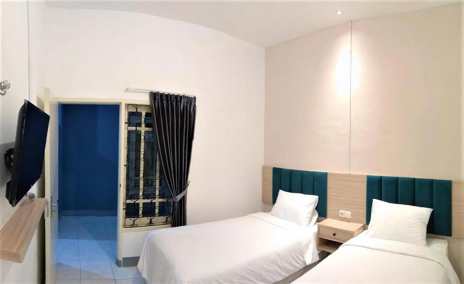 Bedroom in Kokonut Guesthouse