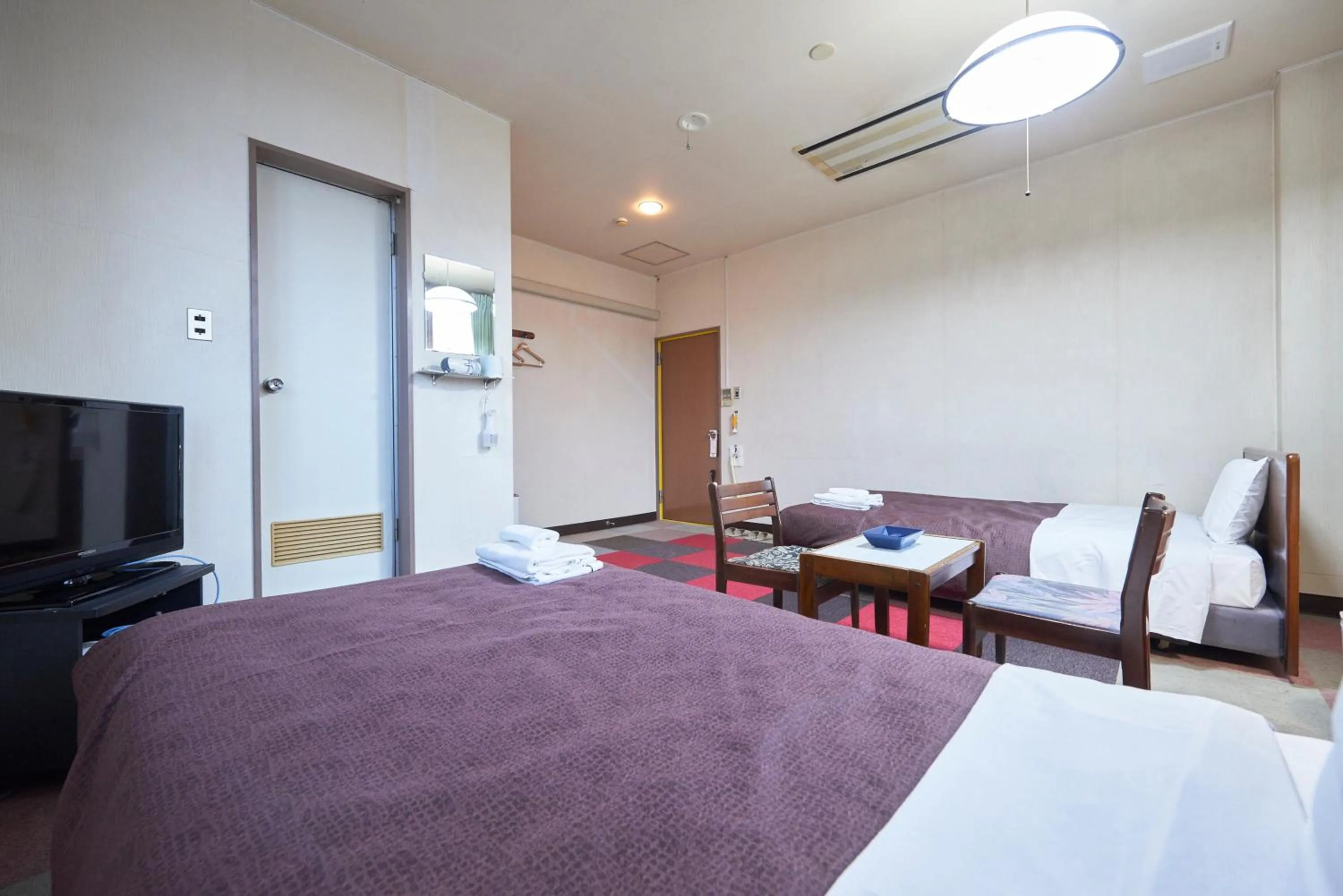 Bed in Hotel Select Inn Furukawa