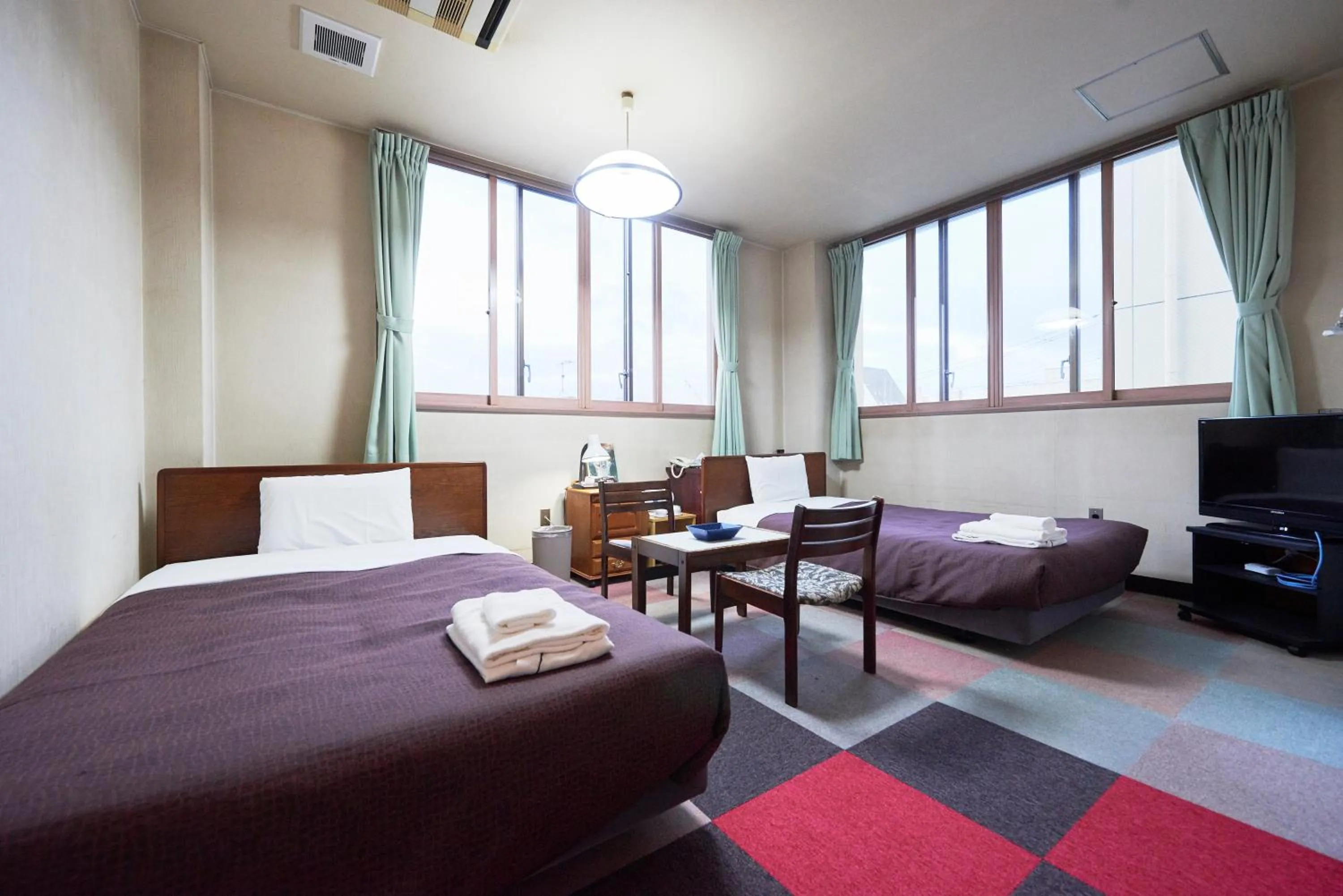 Bed in Hotel Select Inn Furukawa
