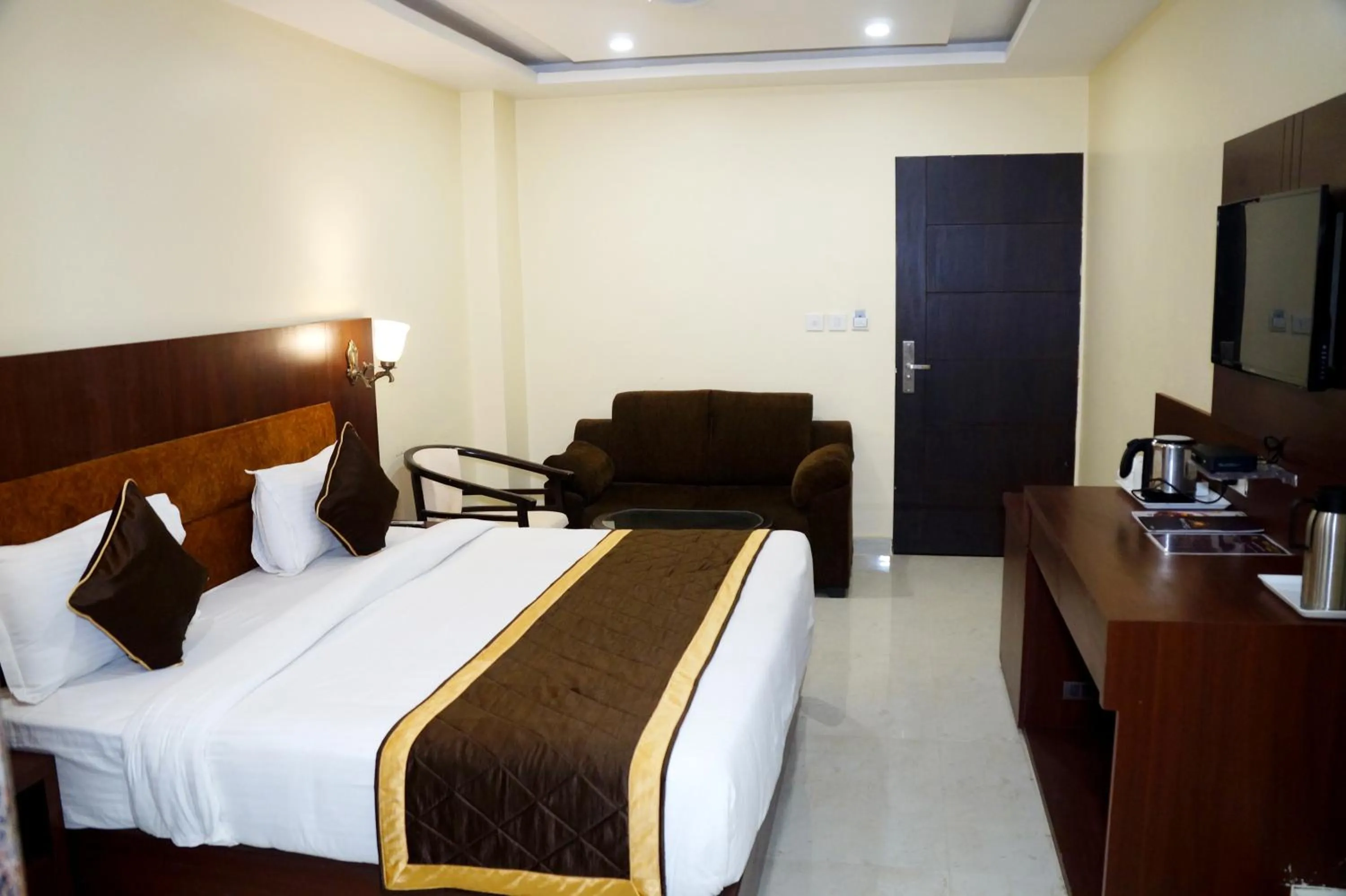 Bed in HOTEL SHIVOY GRAND