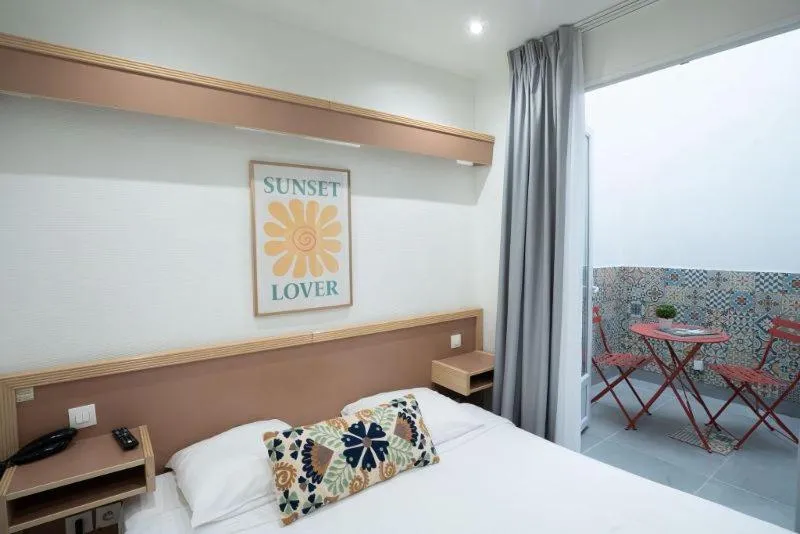 Bed in Hôtel Edgar Quinet