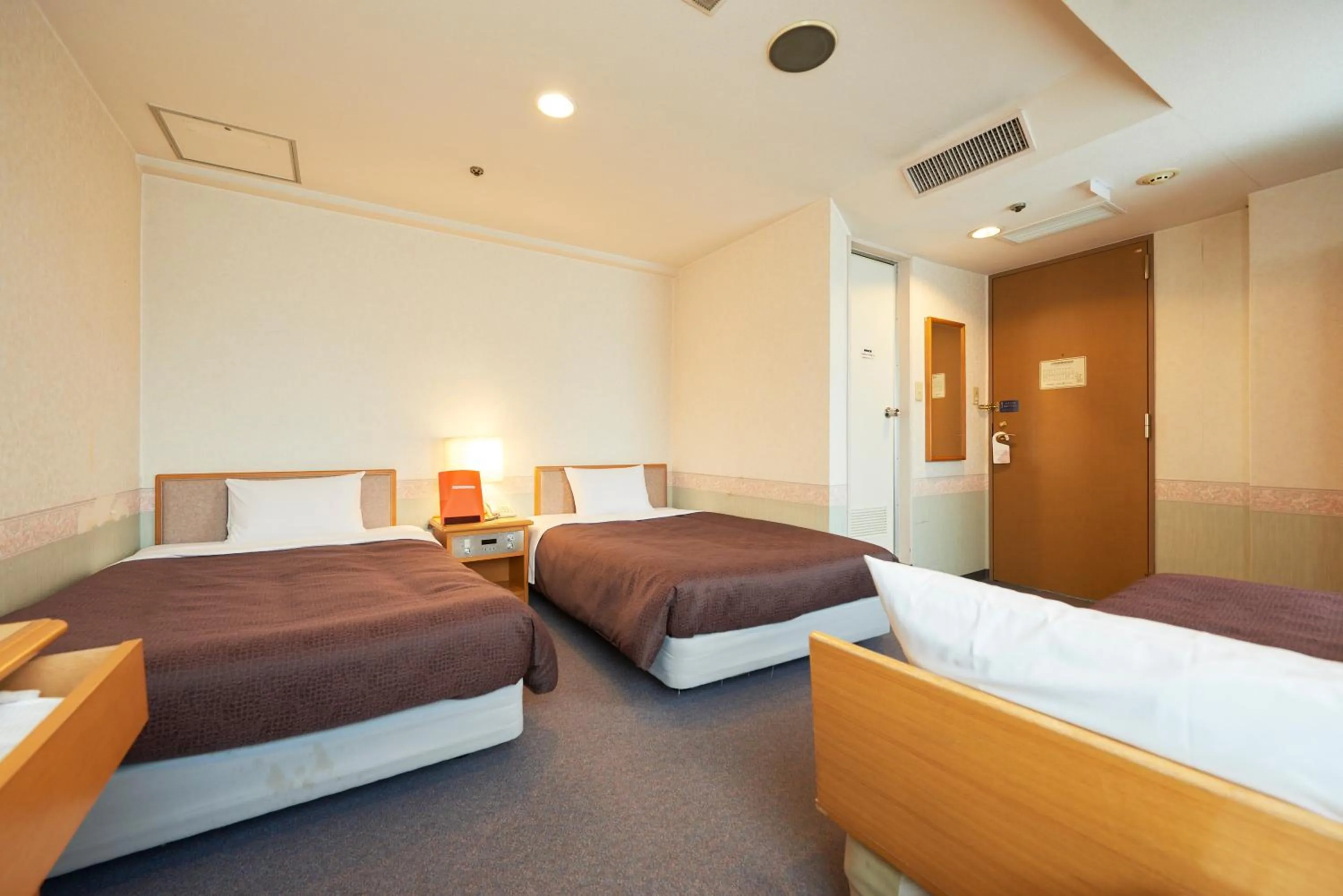 Bed in Hotel Select Inn Aomori