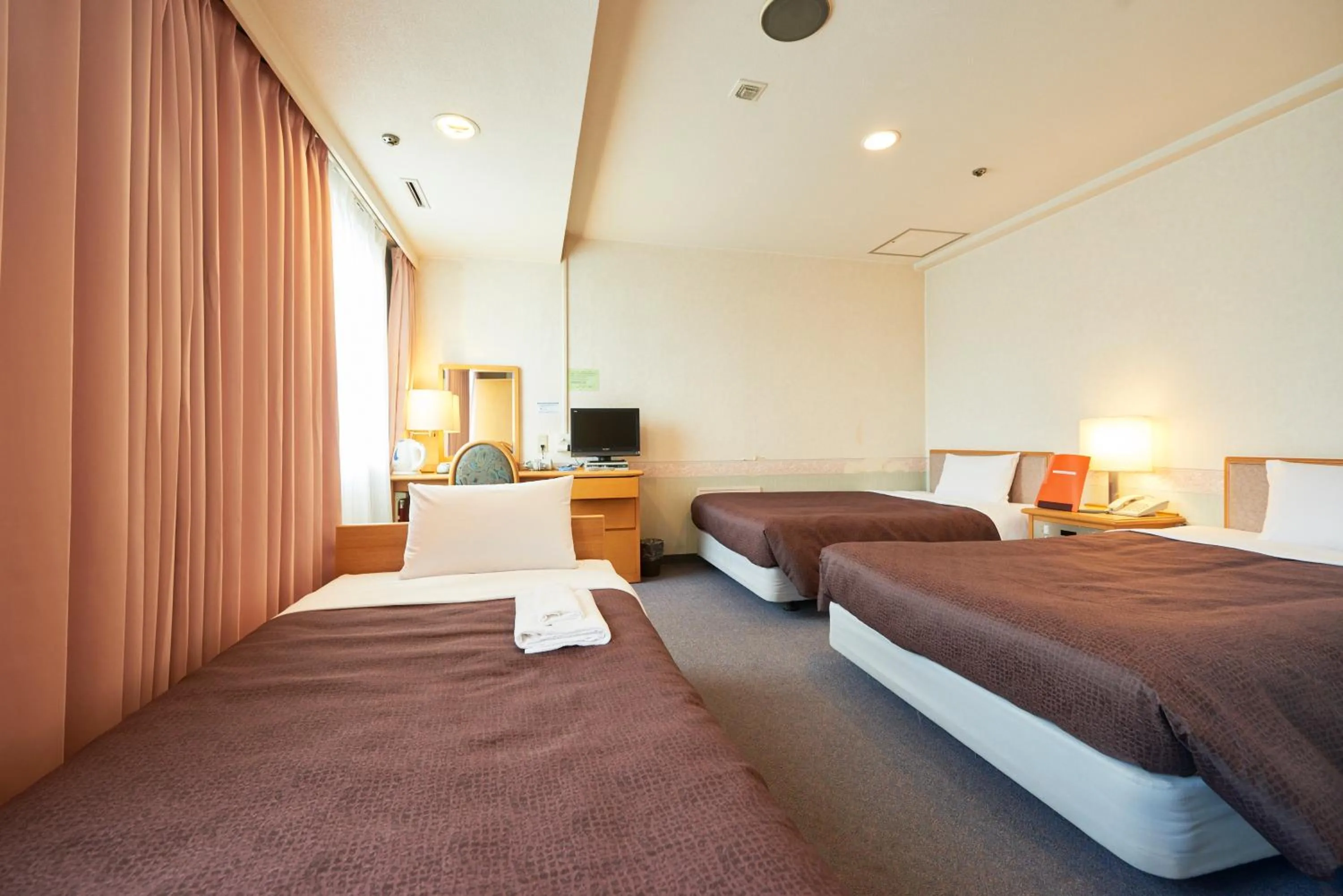 Bed in Hotel Select Inn Aomori