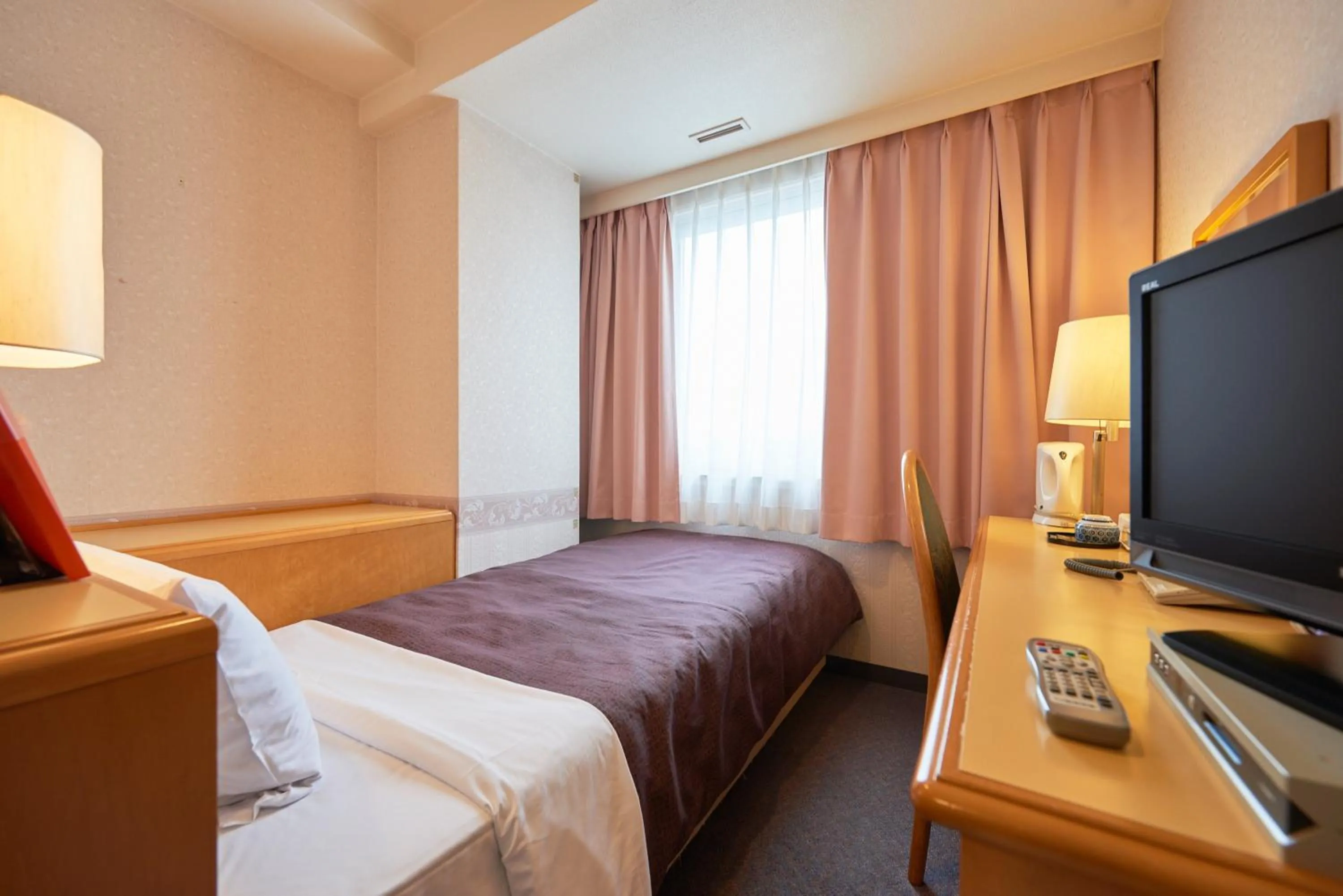 Bed in Hotel Select Inn Aomori