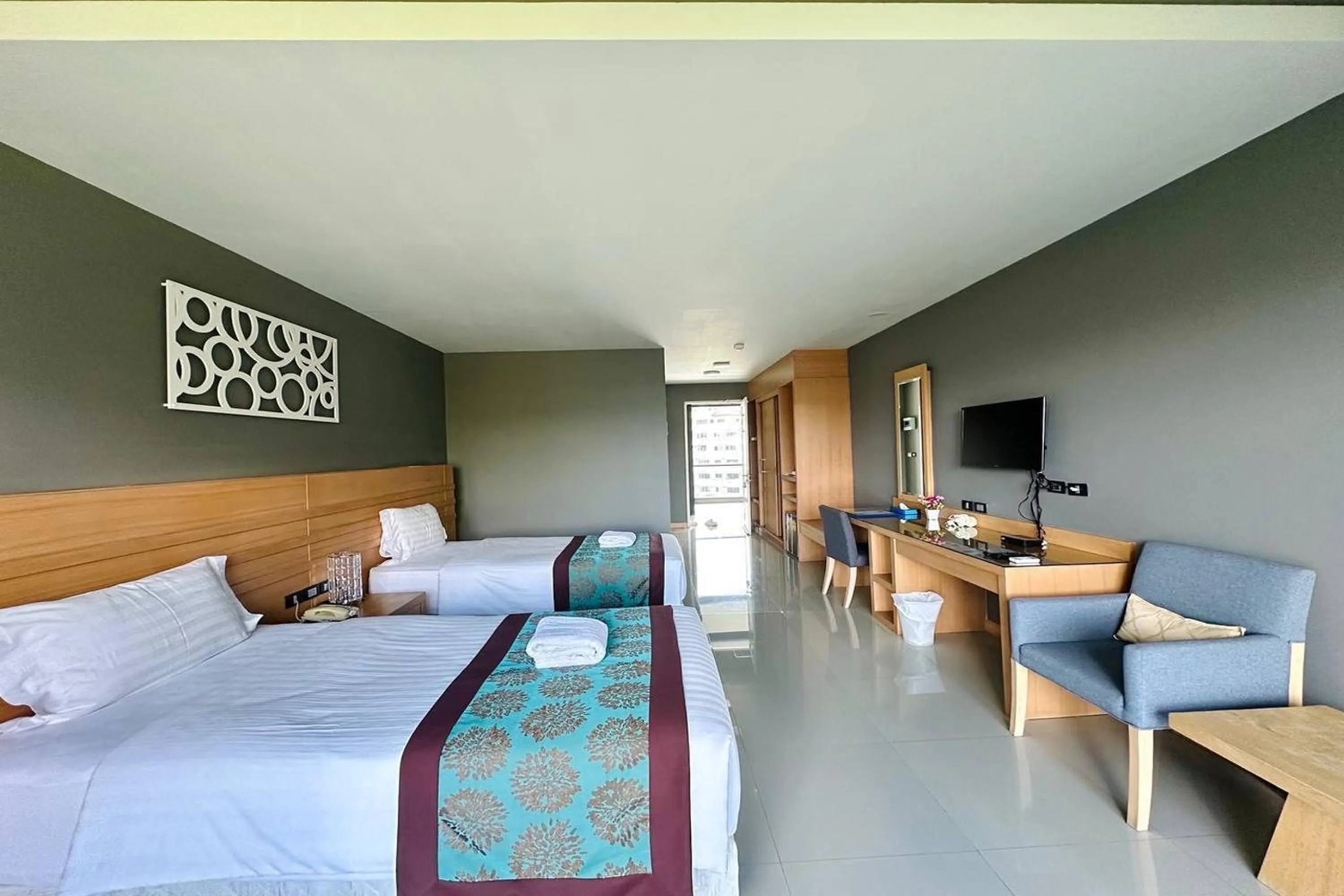 Bed in The Par Phuket SHA Plus
