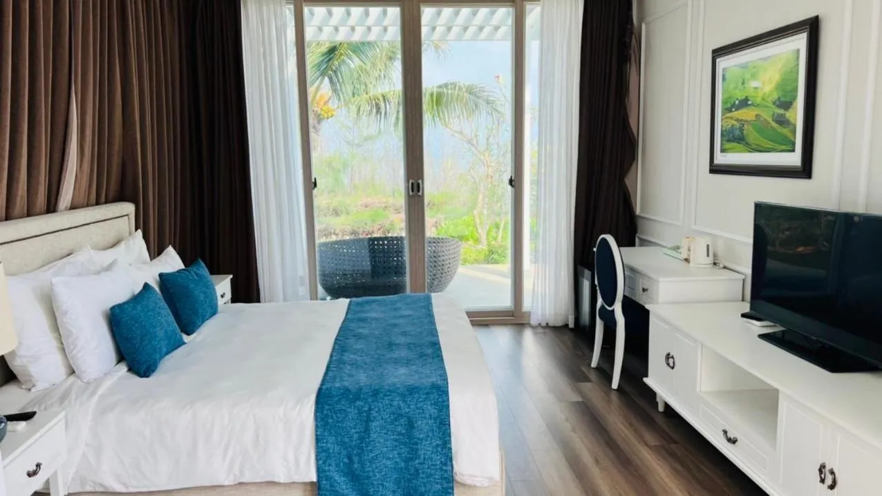 Bed in Villas at Oceanami Resort