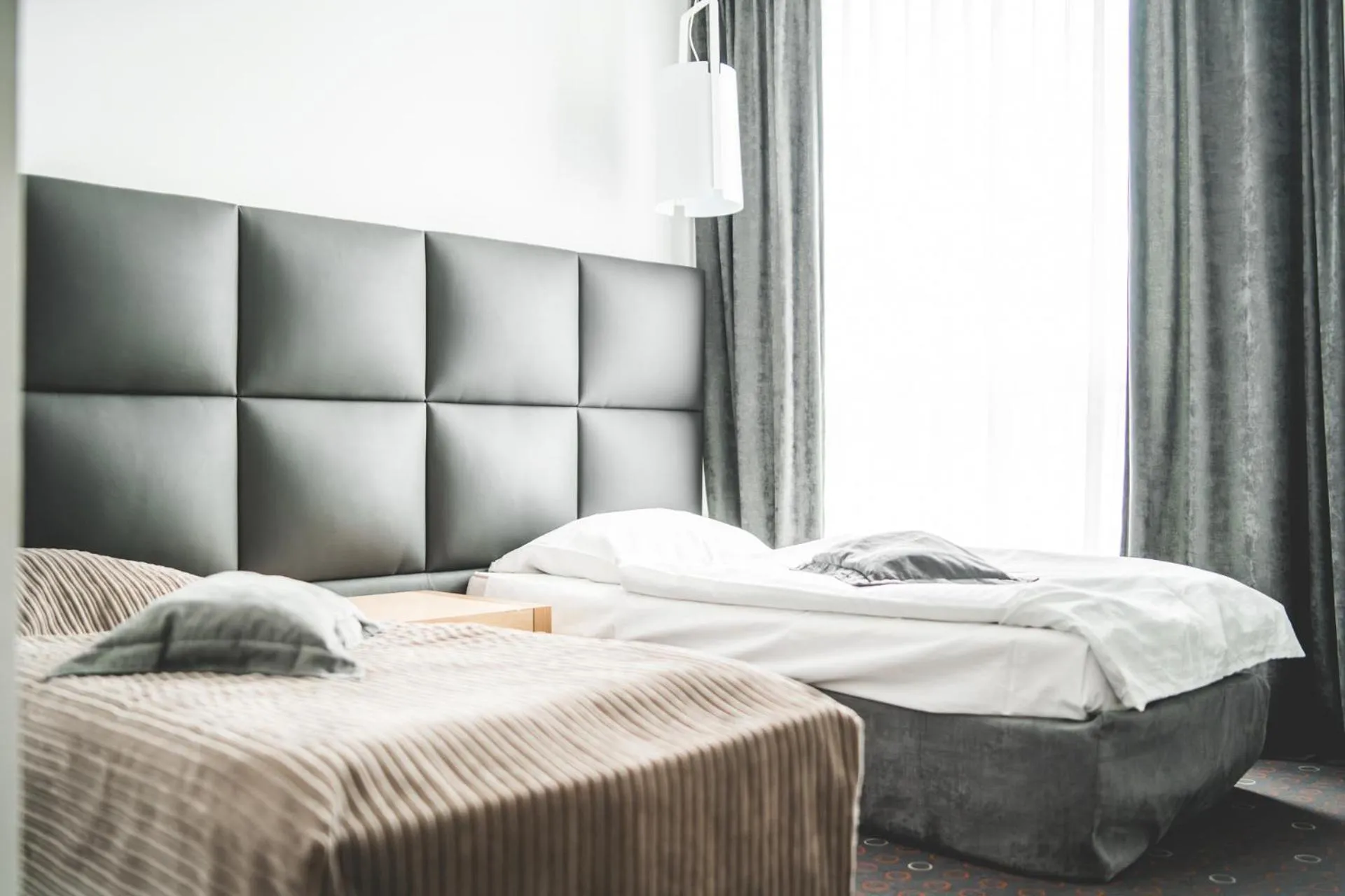 Bed in Aroma Stone Hotel Spa