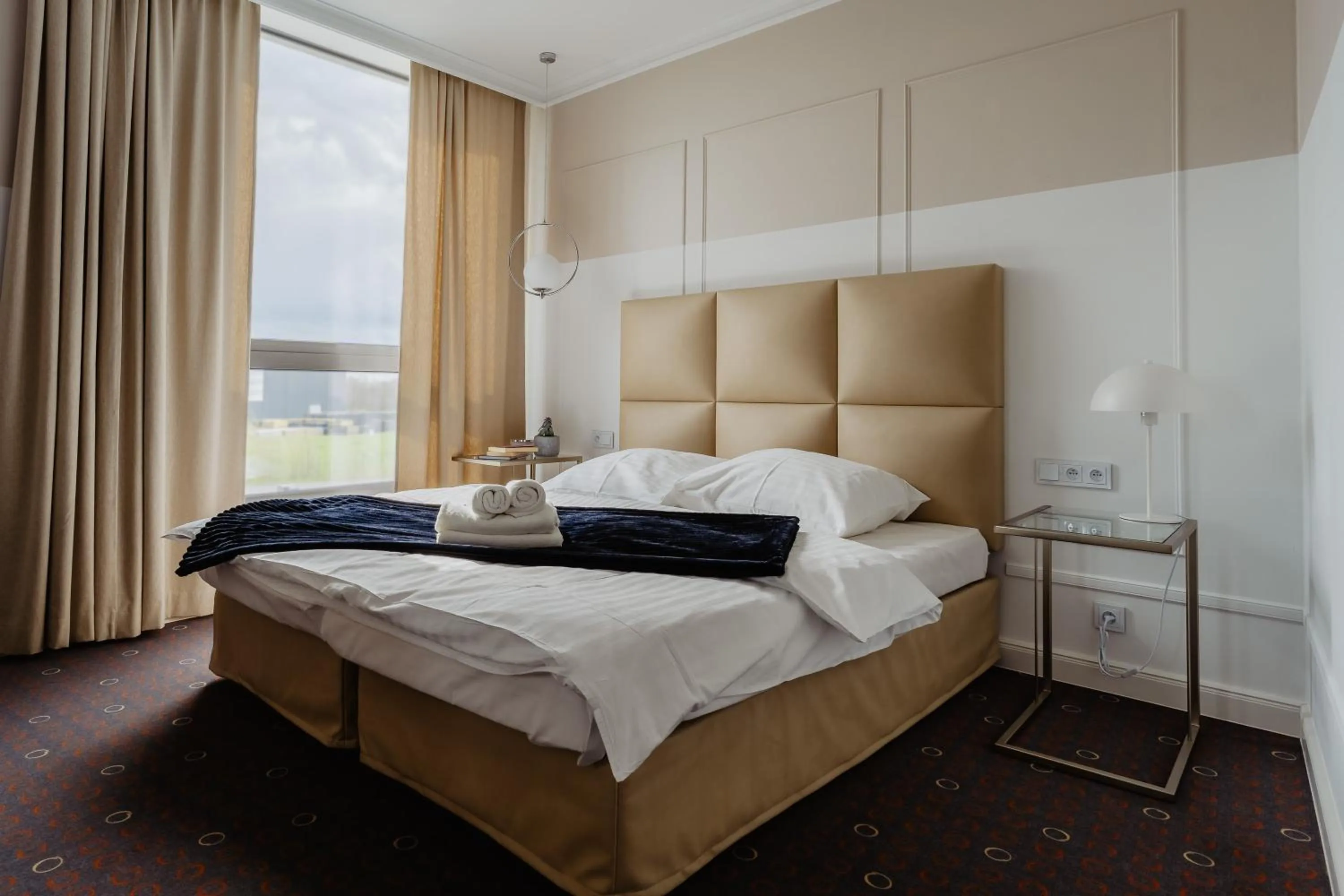 Bed in Aroma Stone Hotel Spa