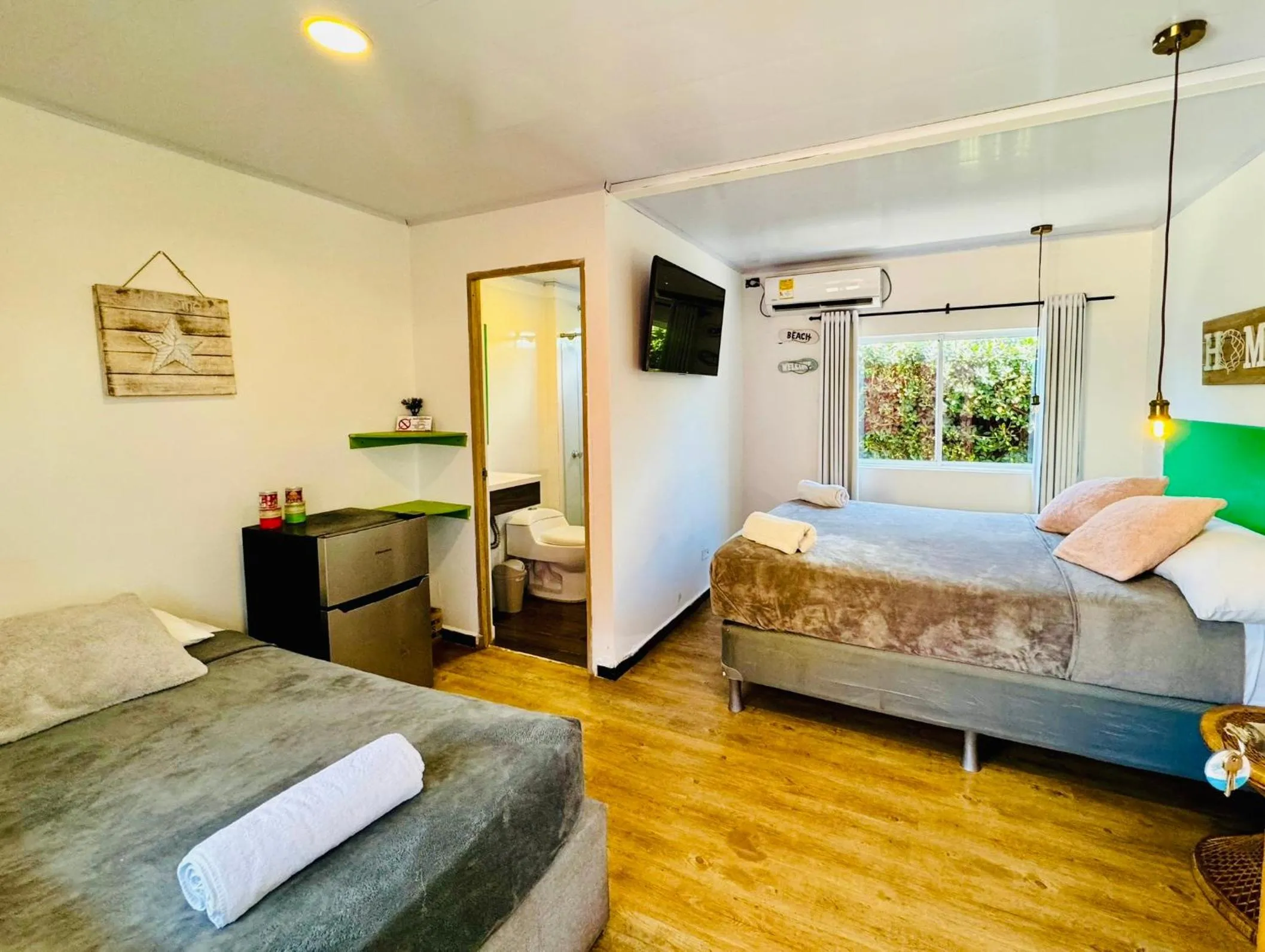 Bed in Be Happy Hotel