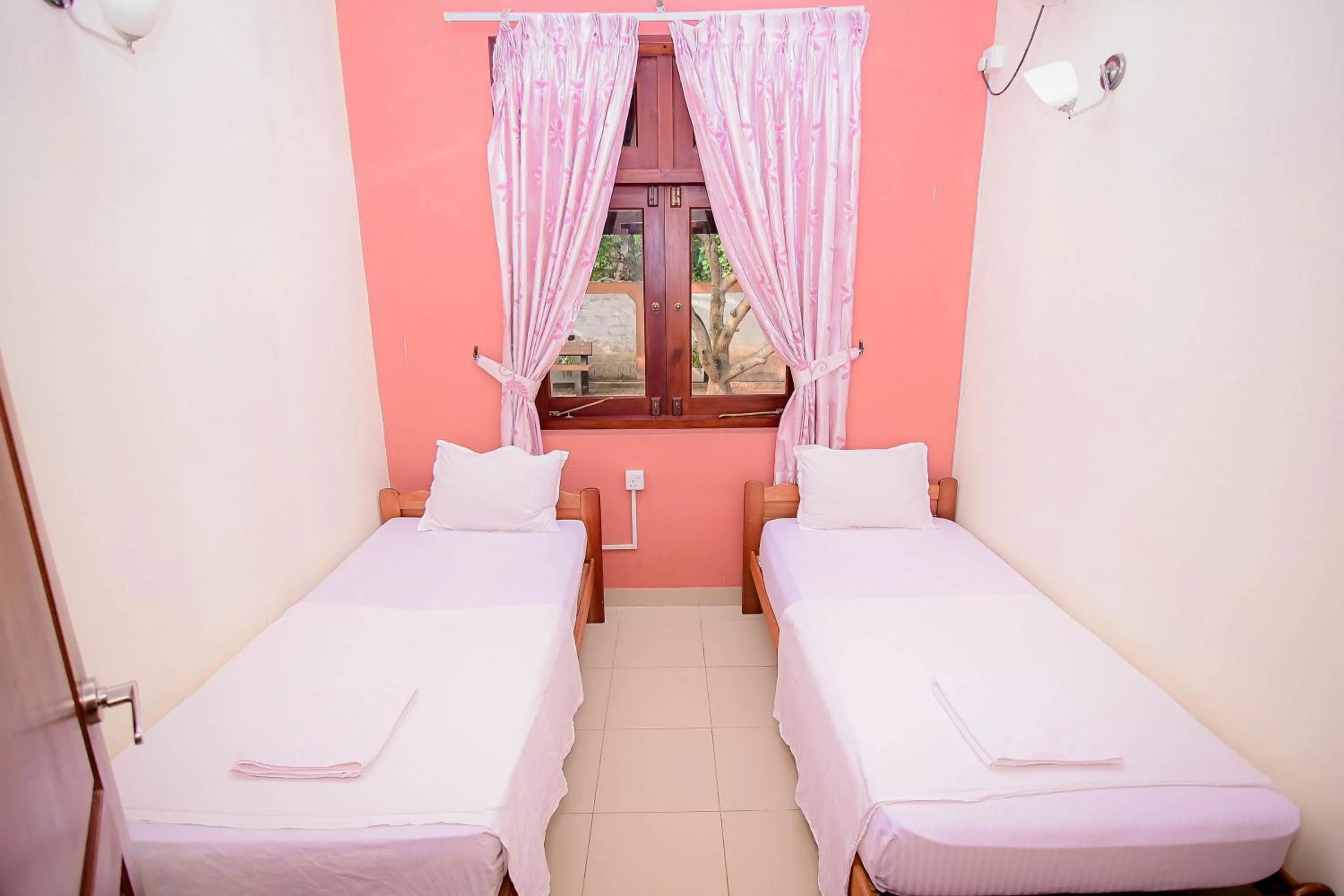 Bed in Airport Villa