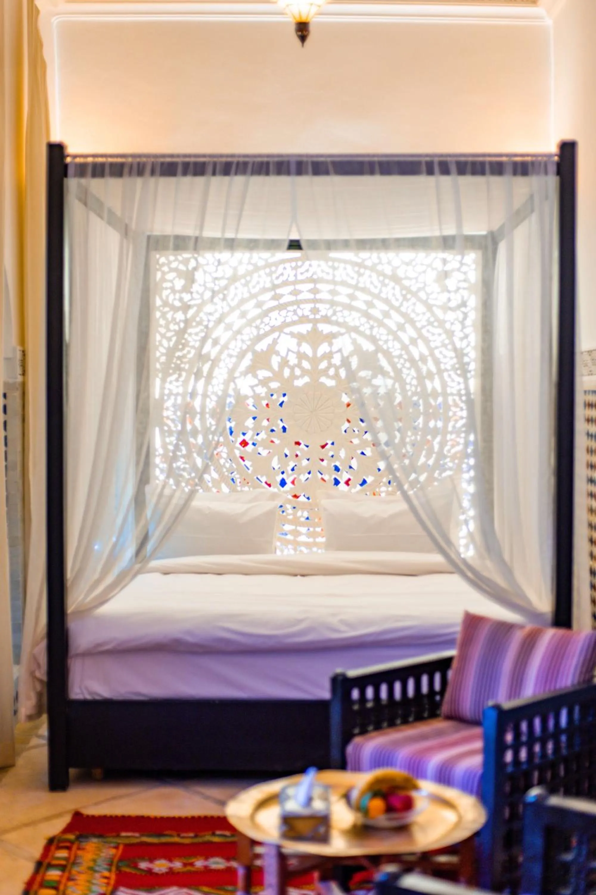 Bed in Riad Dar Dialkoum