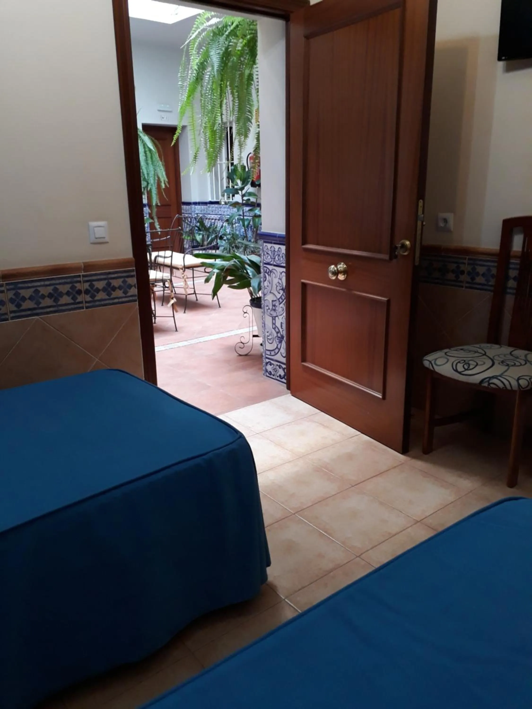 Photo of the whole room, Bed in Pension Doña Trinidad