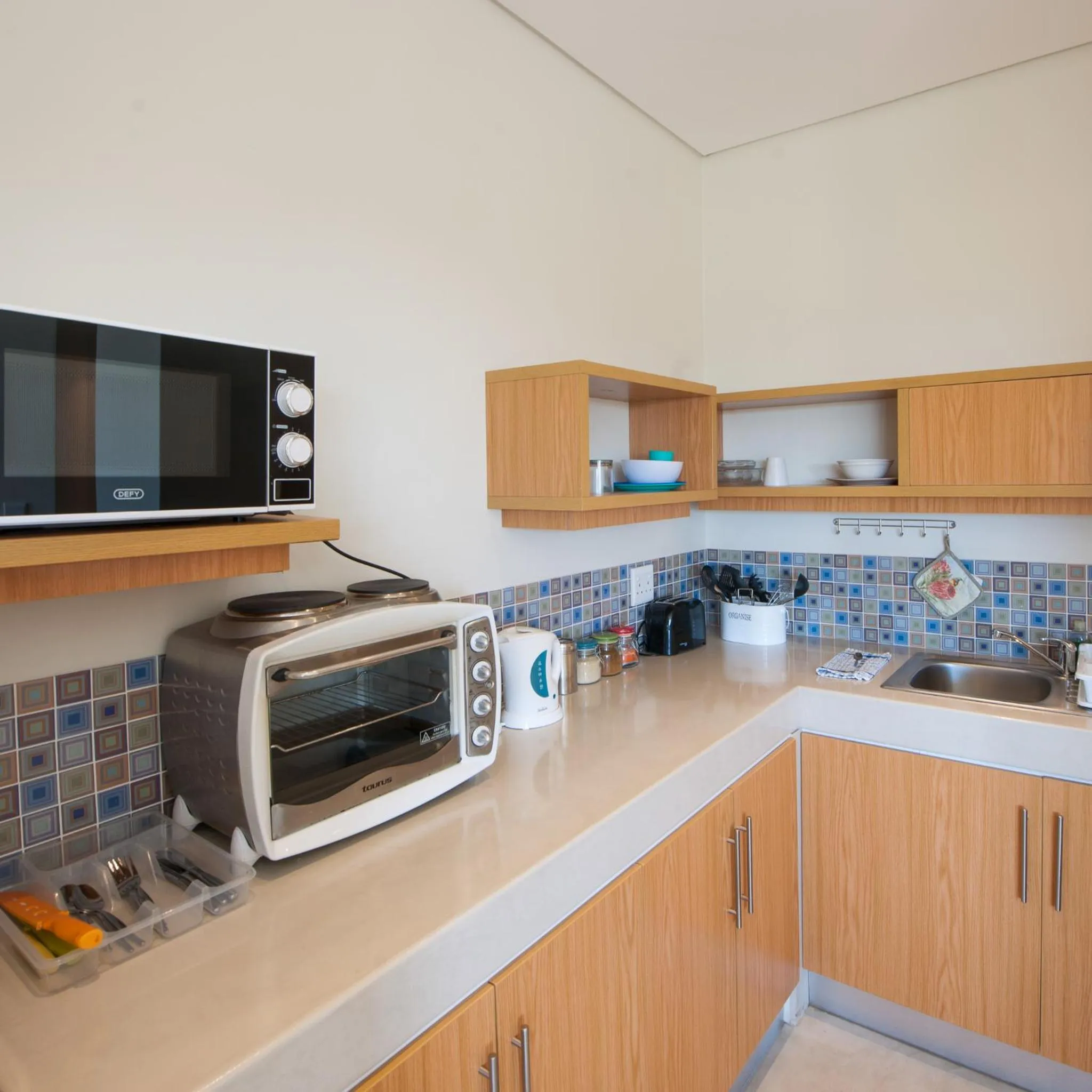 Kitchen or kitchenette in Plett Beachfront Accommodation