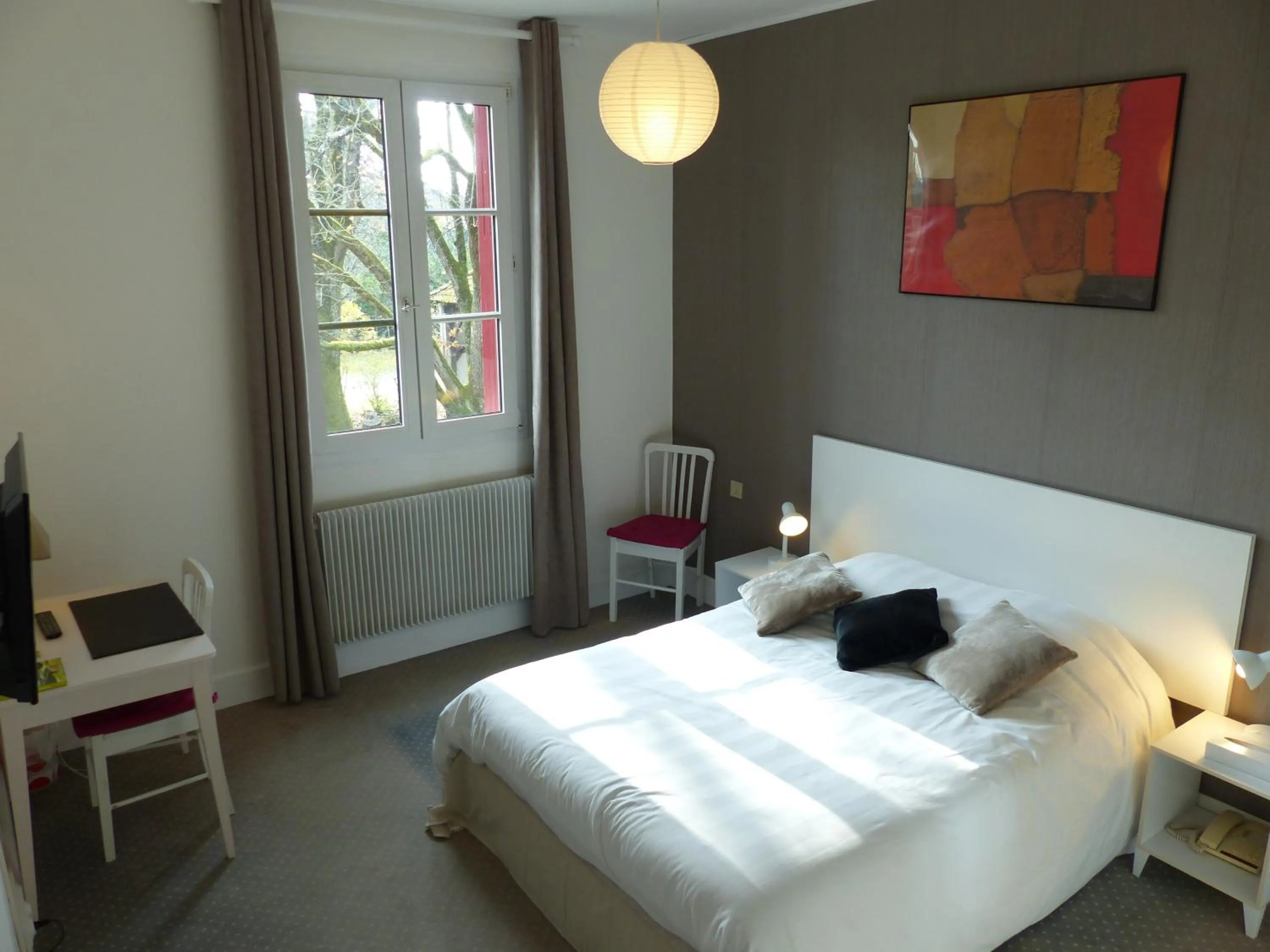 Bedroom, Bed in Logis Hotels - Au Colombier du Touron