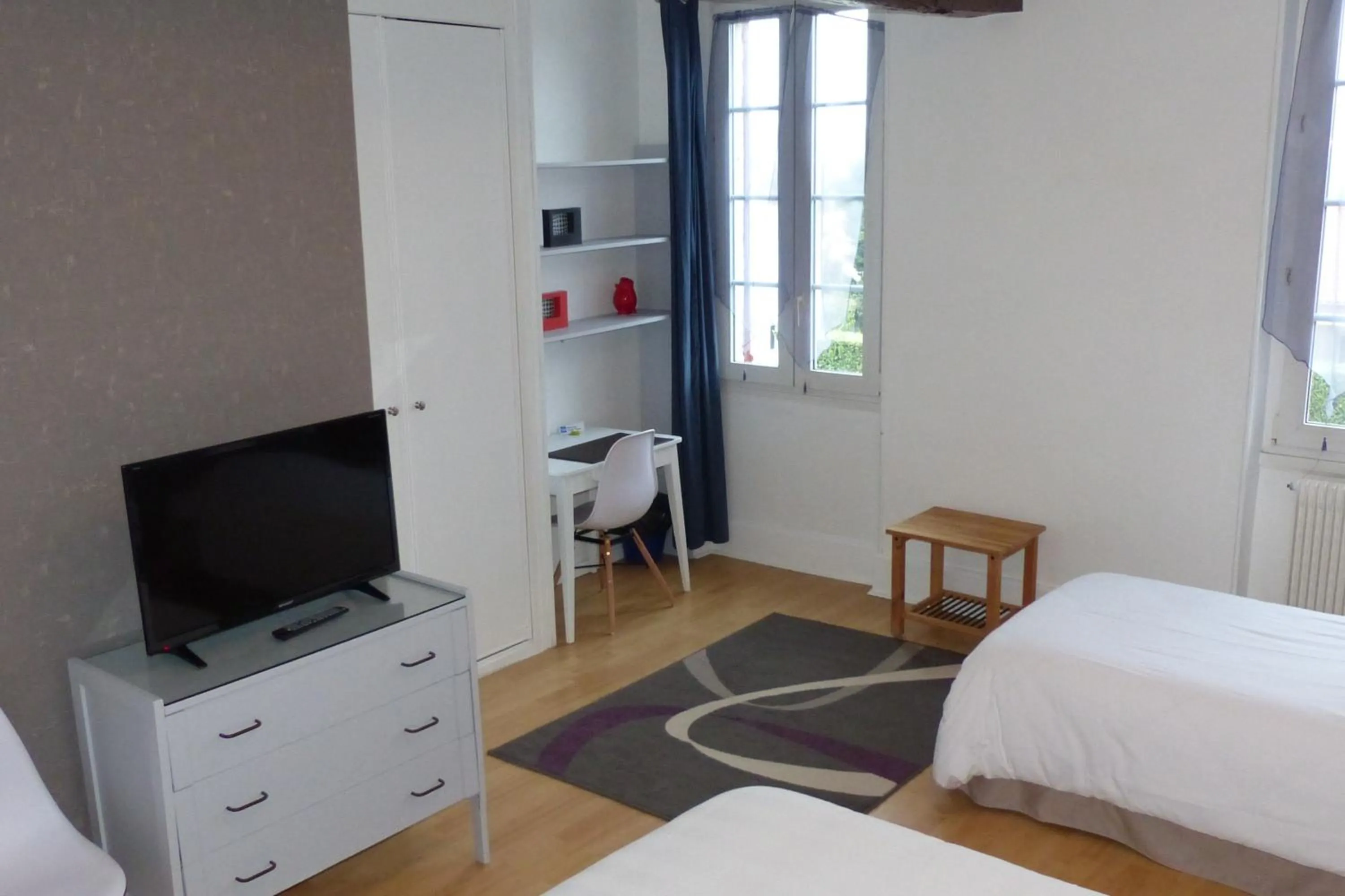 Bed in Logis Hotels - Au Colombier du Touron