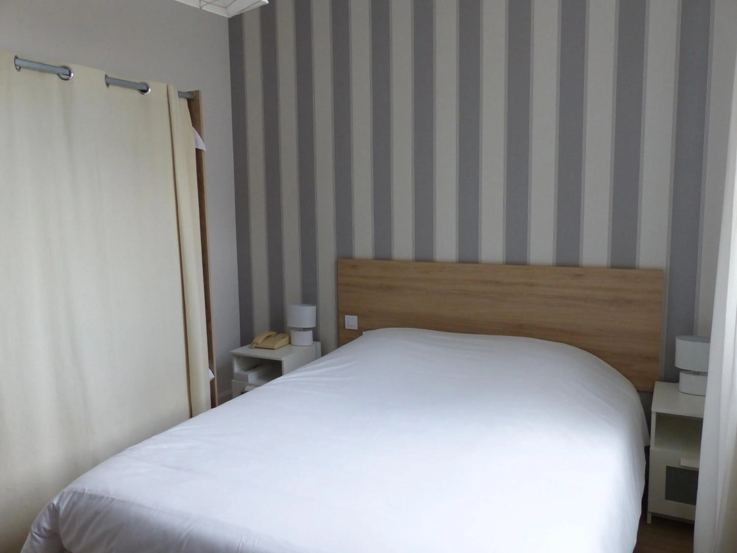 Bedroom, Bed in Logis Hotels - Au Colombier du Touron