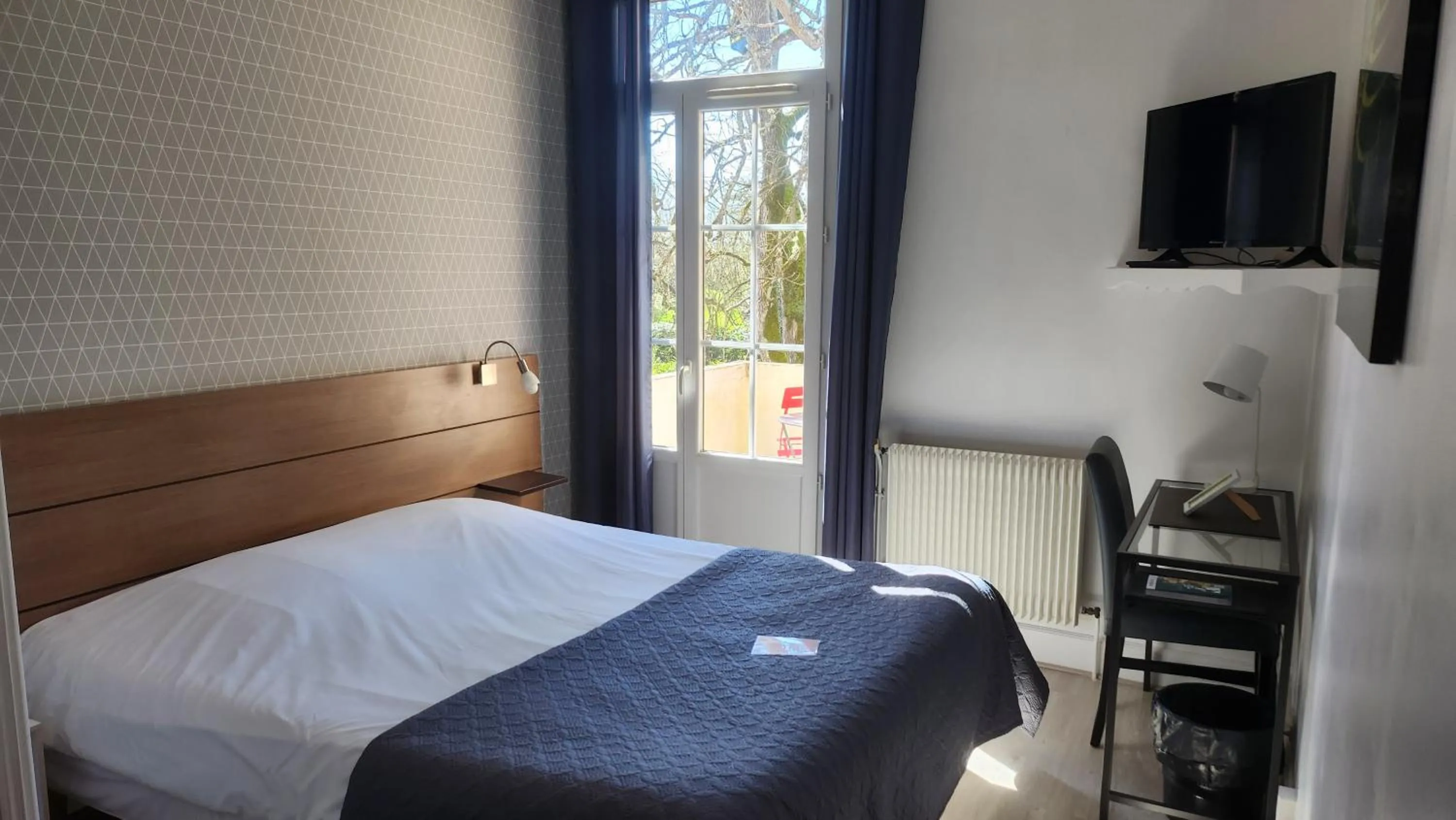 Bed in Logis Hotels - Au Colombier du Touron