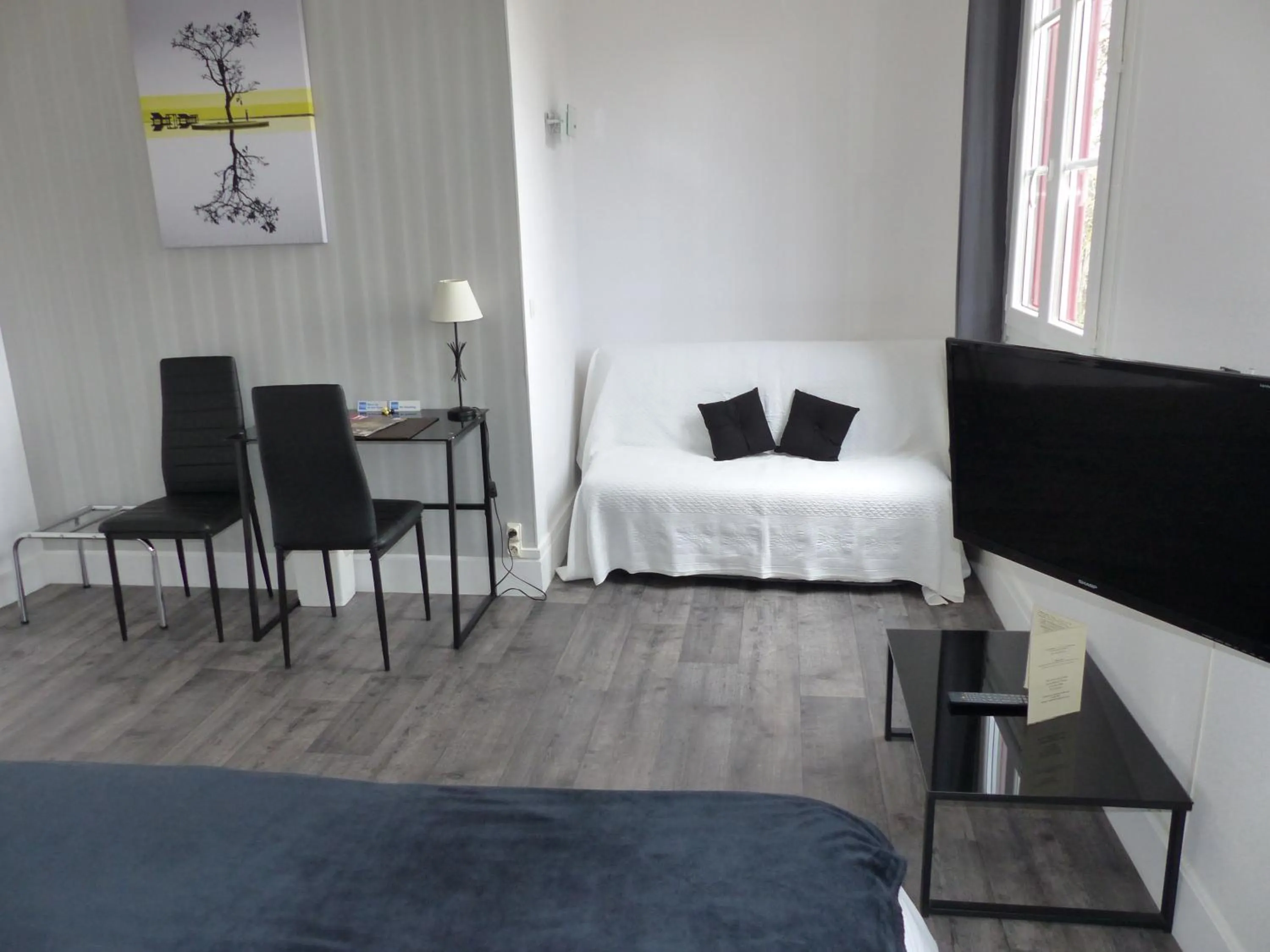 Bedroom, Bed in Logis Hotels - Au Colombier du Touron