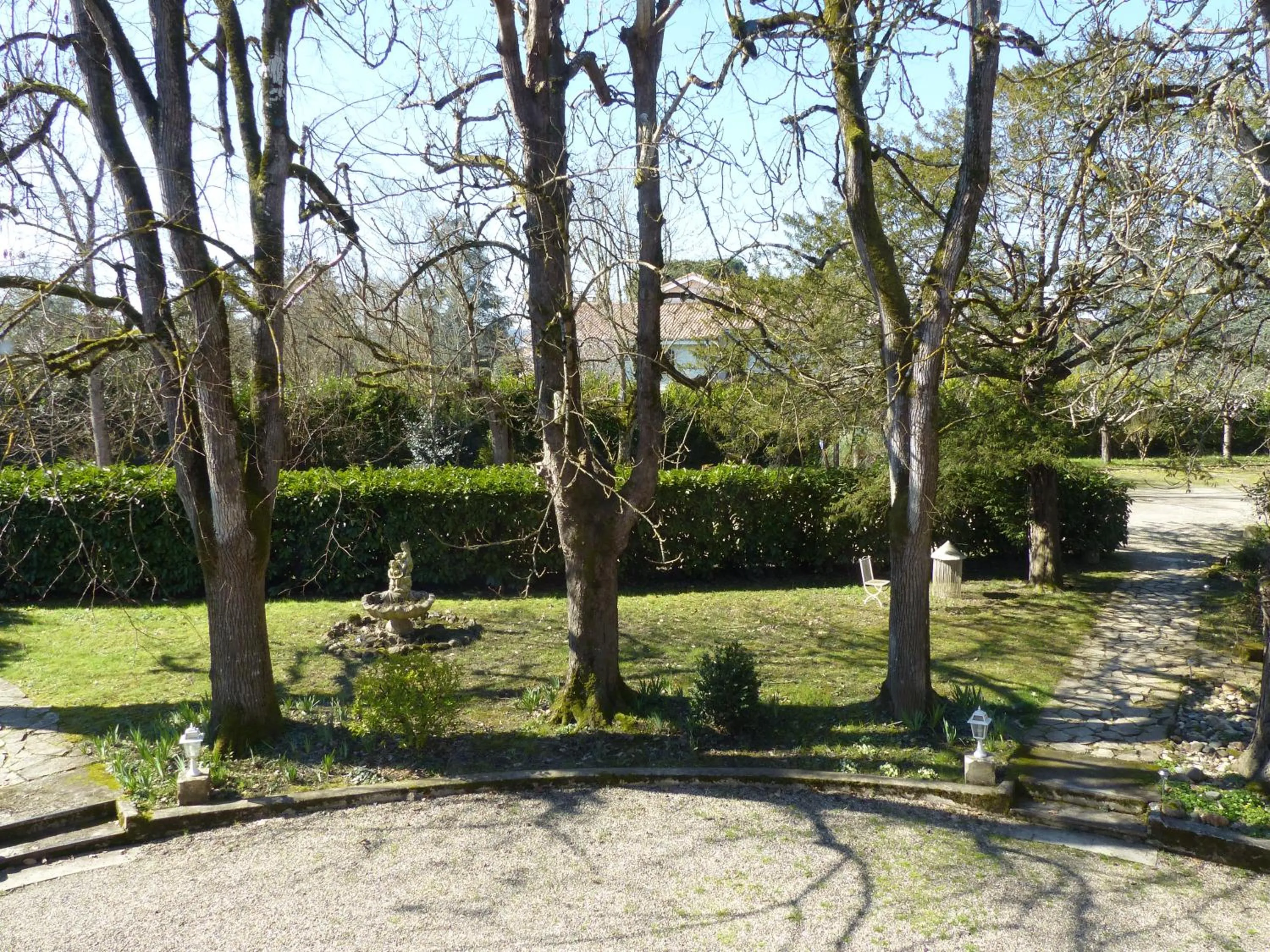 Garden in Logis Hotels - Au Colombier du Touron