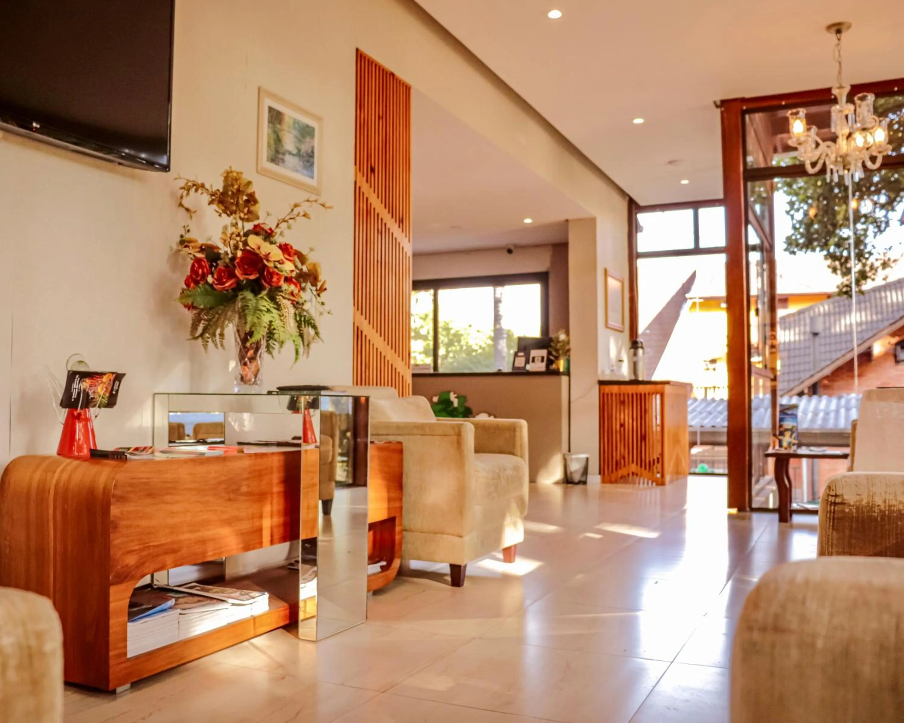 Communal lounge/ TV room in Hotel Pequeno Bosque