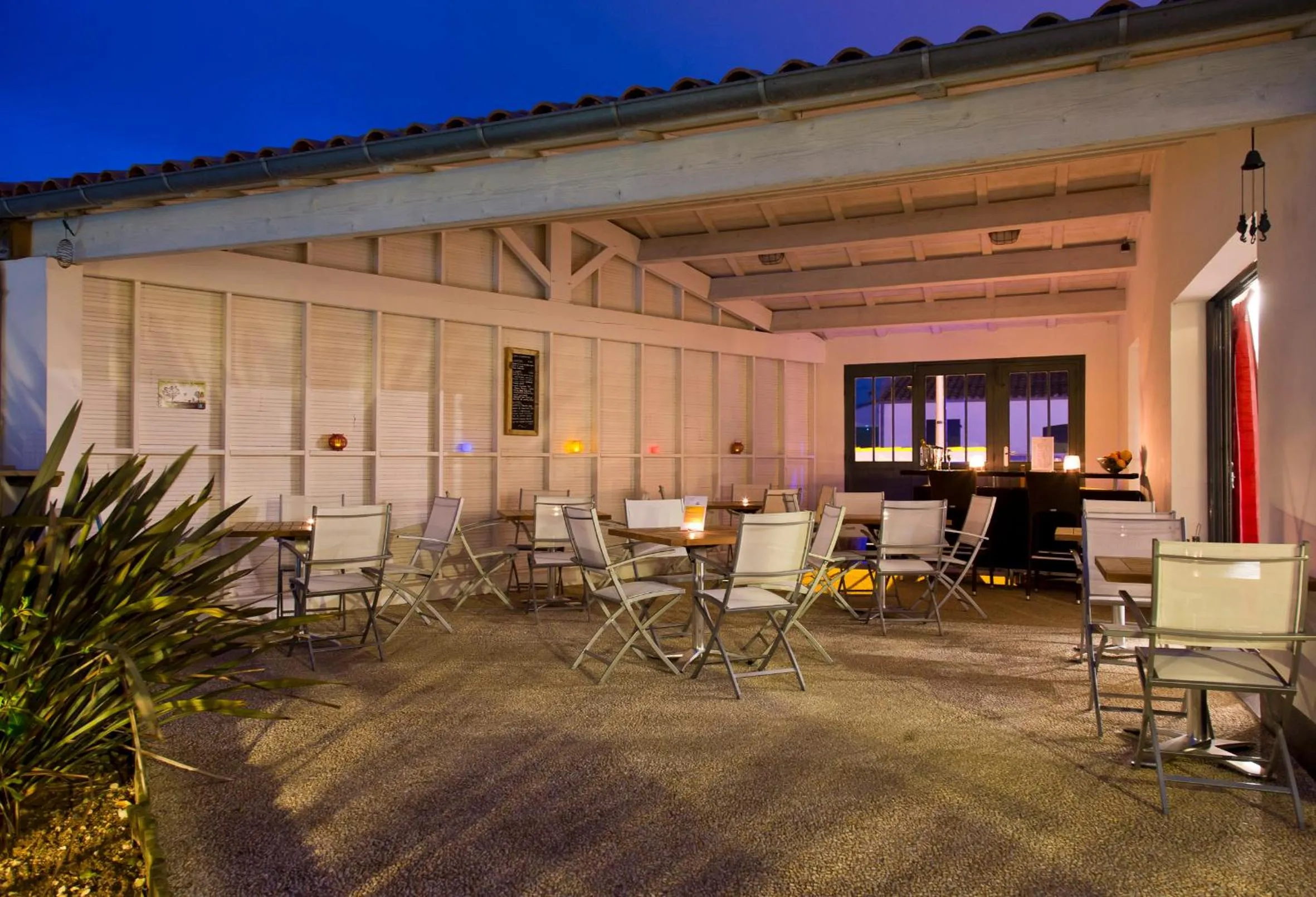 Patio in Hôtel Les Vignes de la Chapelle, "The Originals Relais"