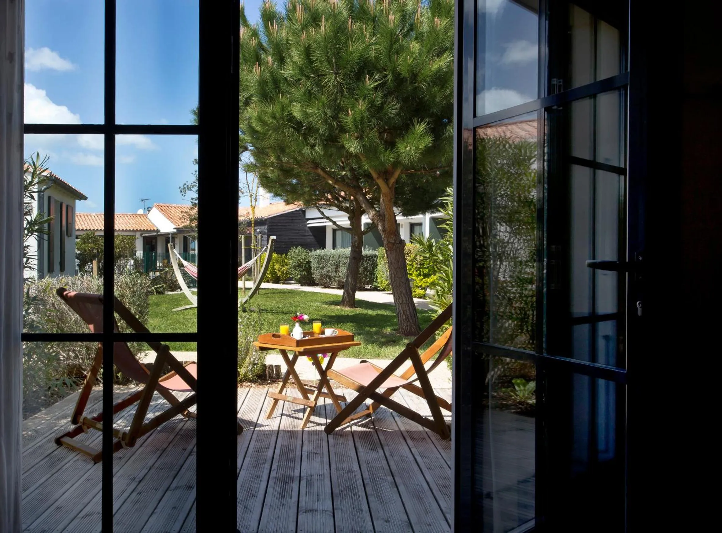 Patio in Hôtel Les Vignes de la Chapelle, "The Originals Relais"