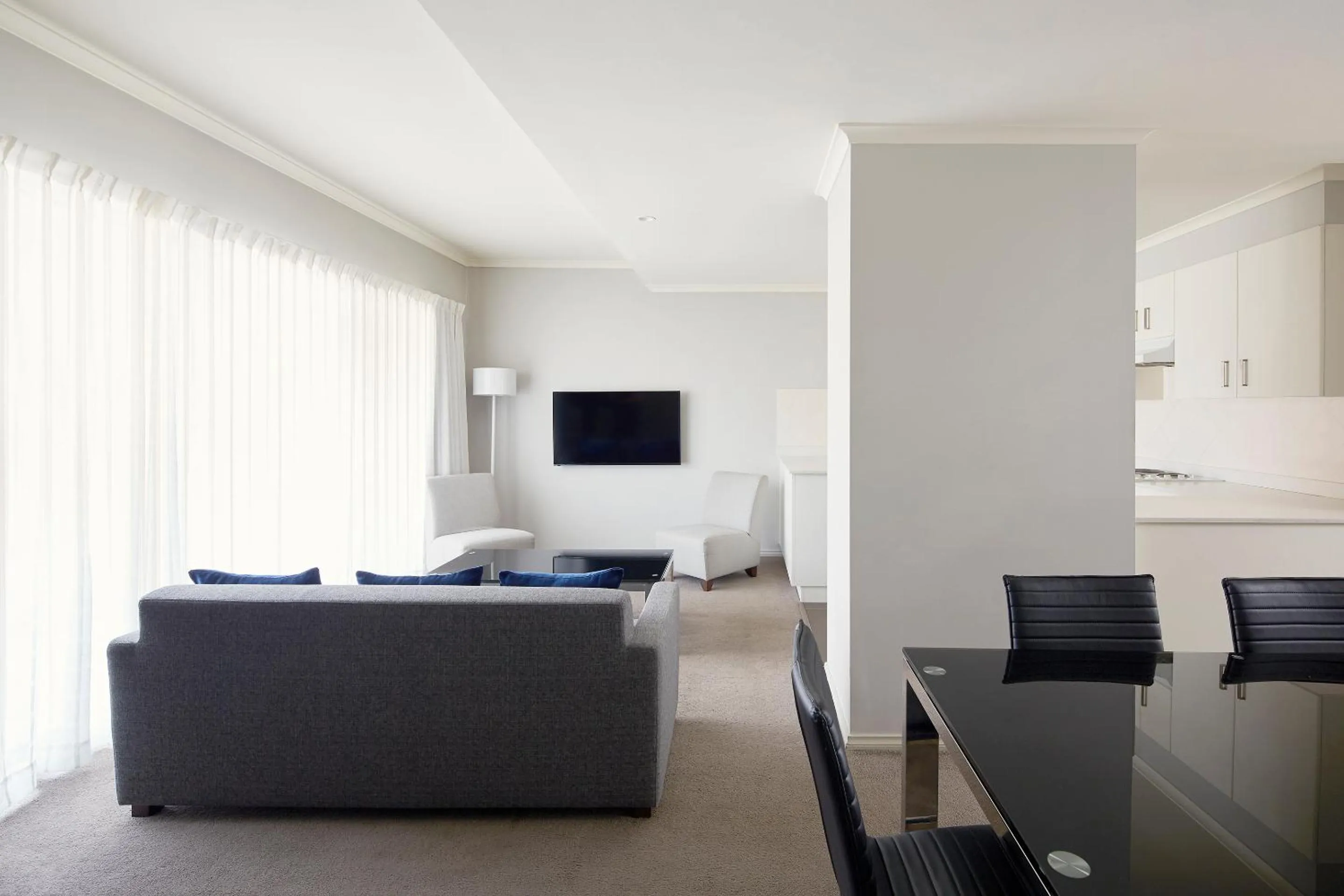 Seating area, Bed in Pinnacle Apartments