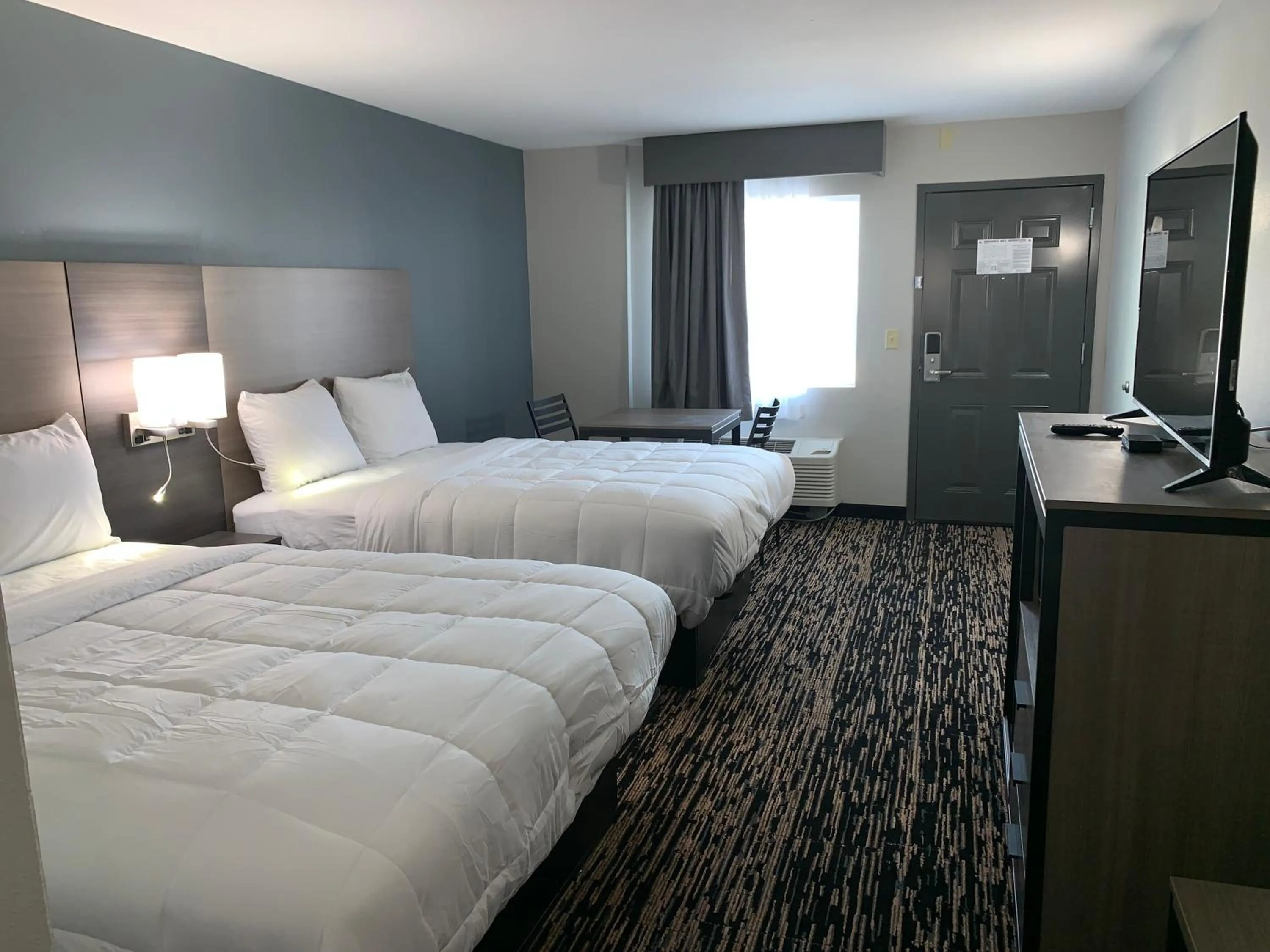 Bed in Super 8 by Wyndham Sulphur South