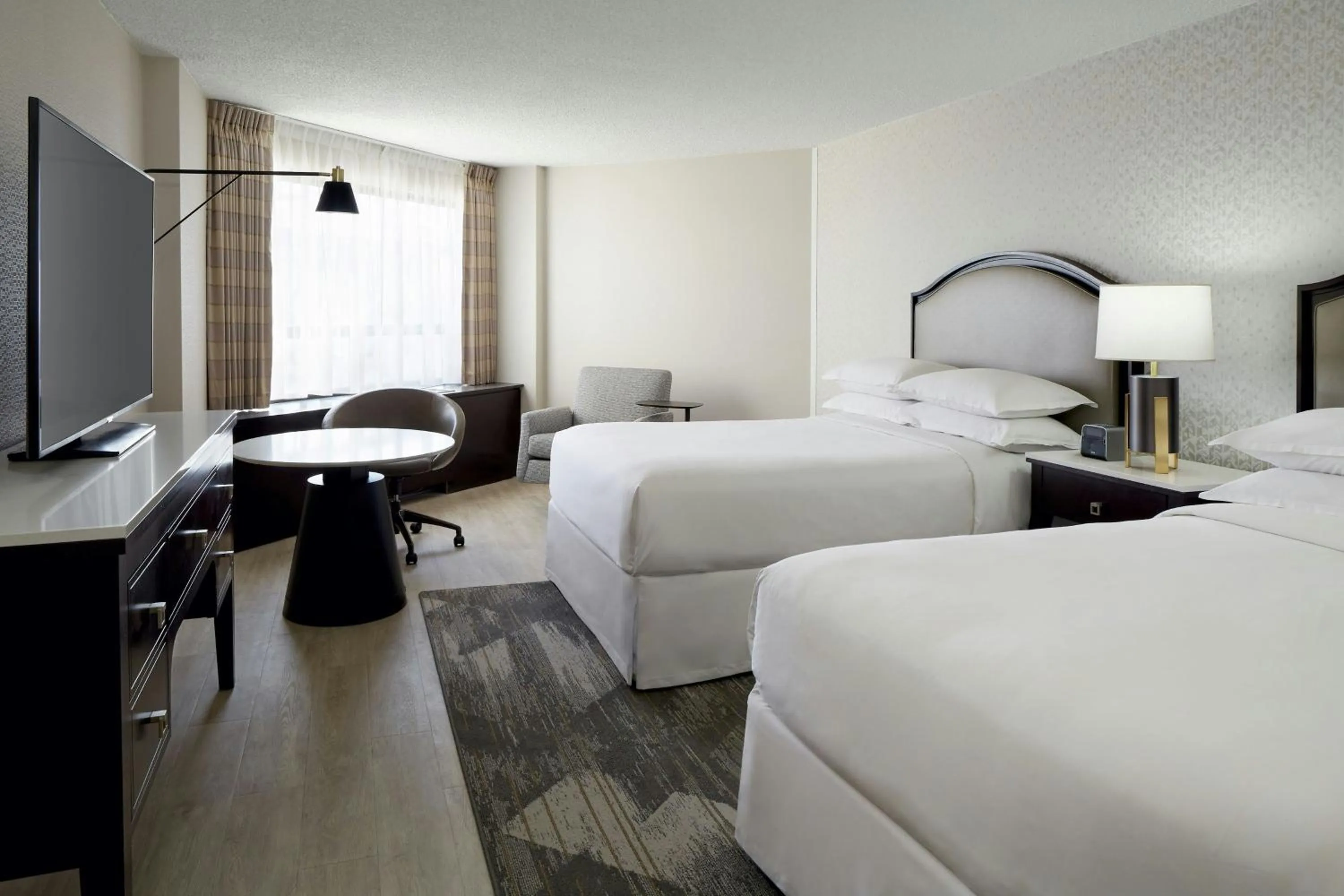 Photo of the whole room, Bed in Sheraton Montreal Airport Hotel