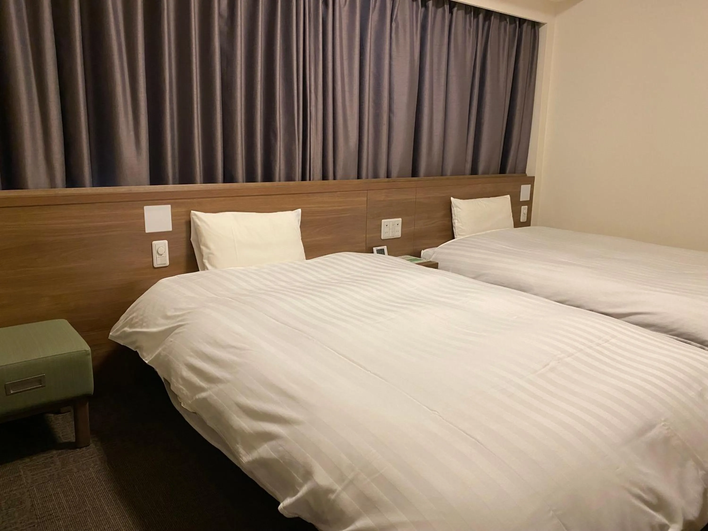 Bed in Dormy Inn Morioka
