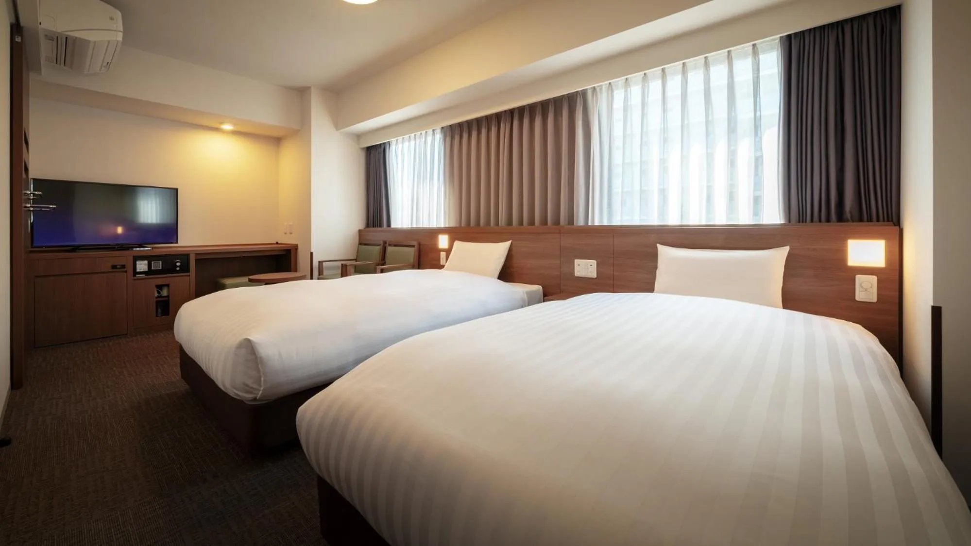 Bed in Dormy Inn Morioka