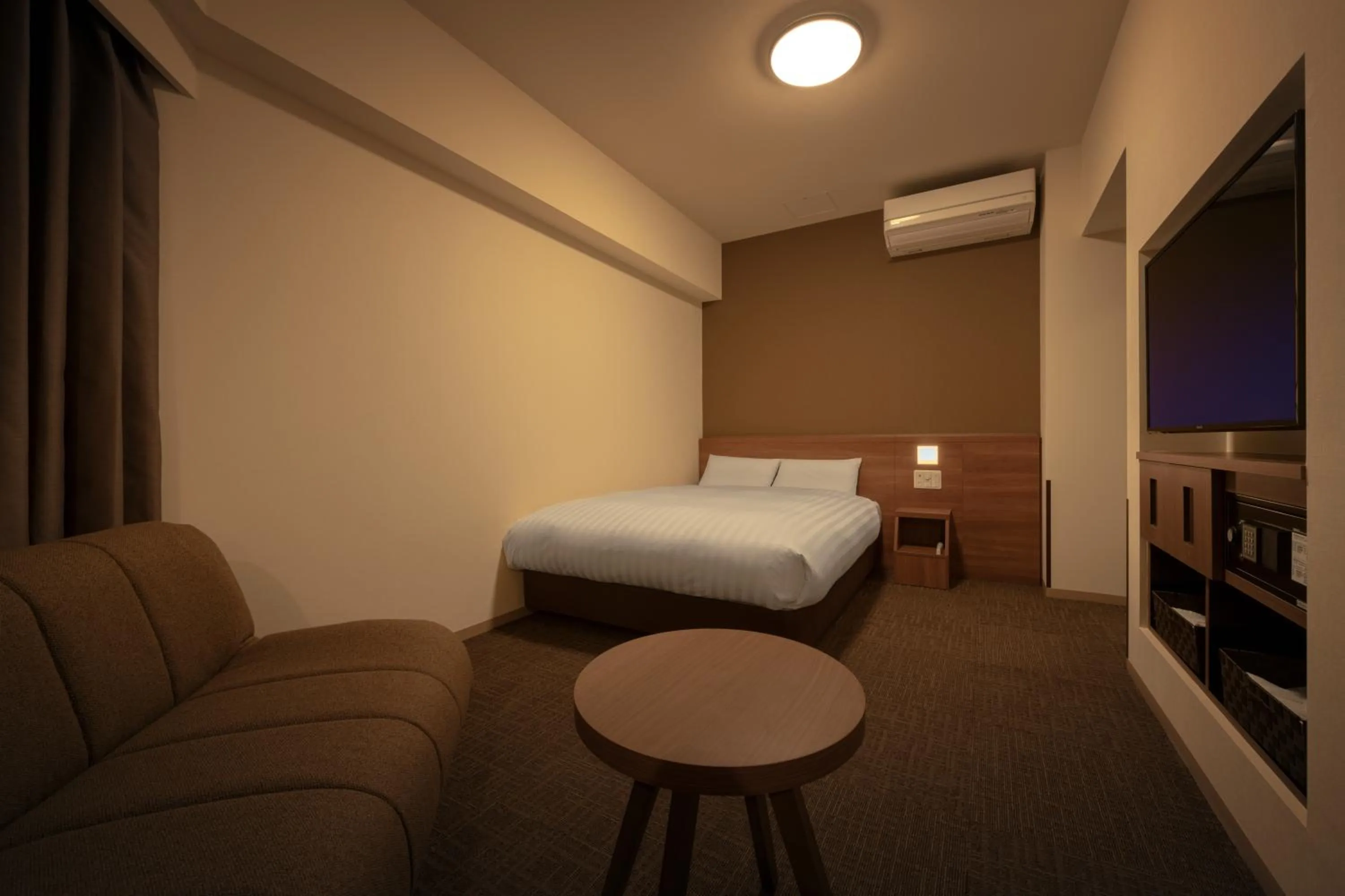 Bed in Dormy Inn Morioka