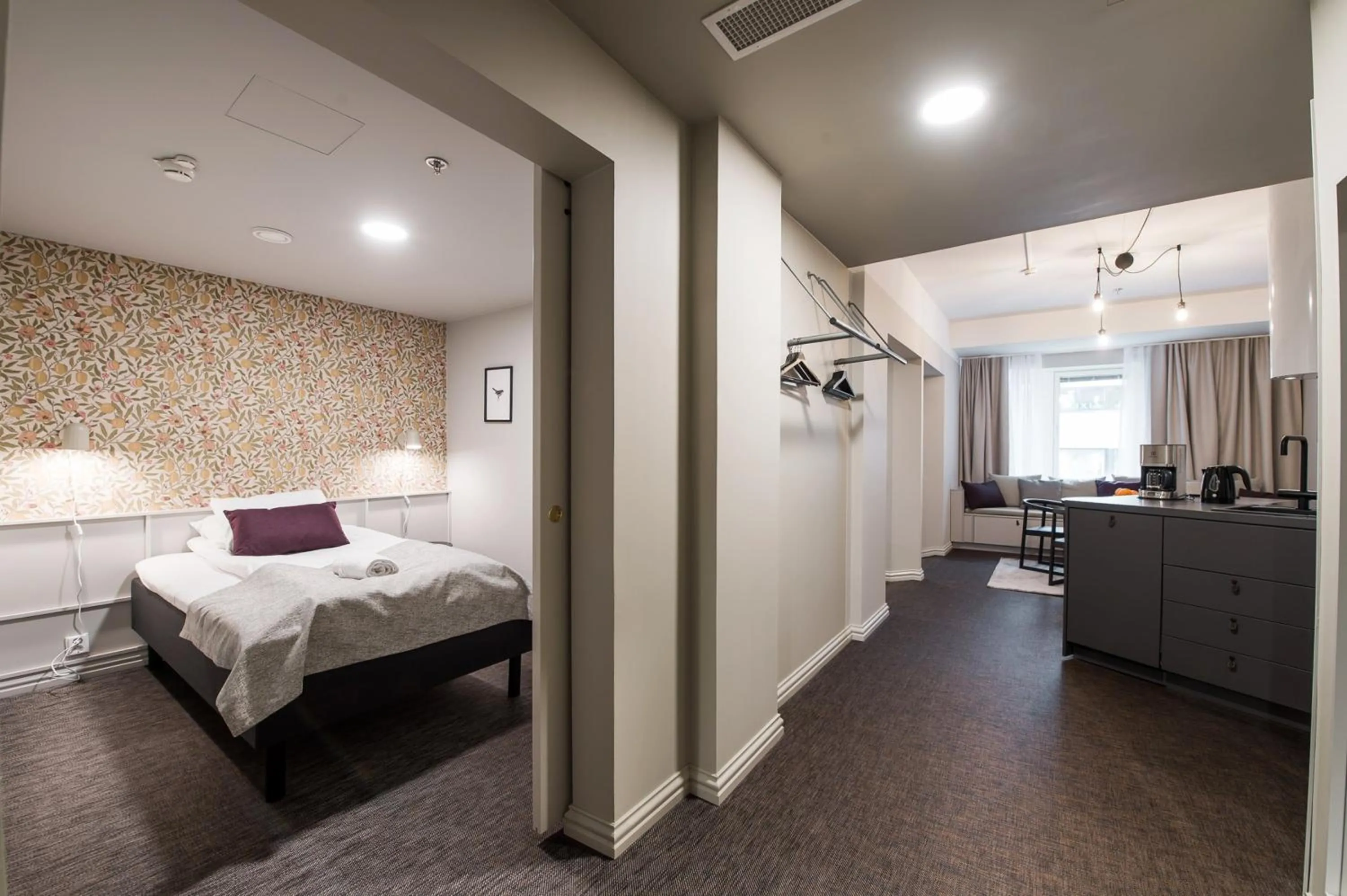 Kitchen or kitchenette, Bed in Forenom Aparthotel Turku