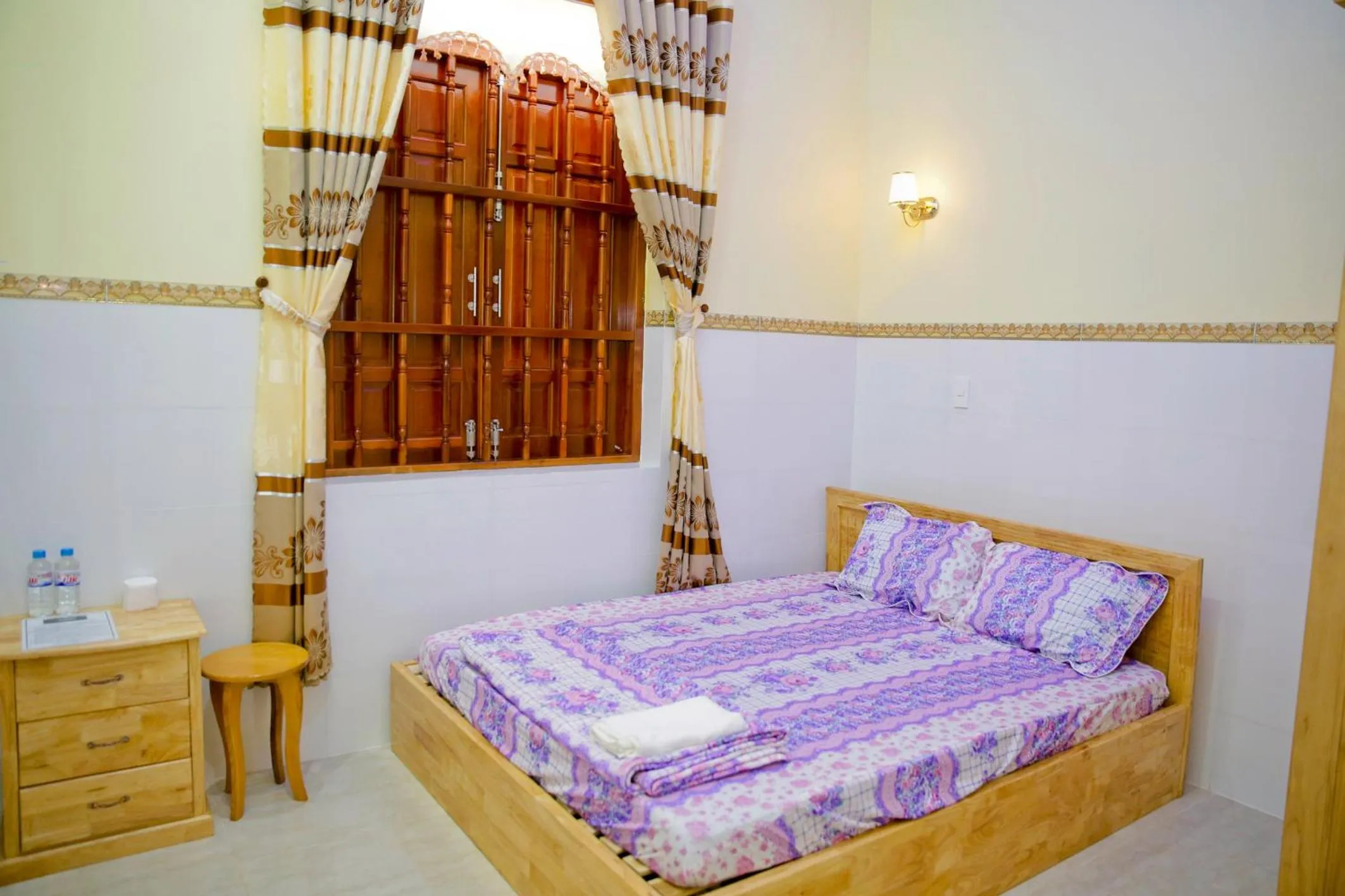 Bed in Nhà Nghỉ Quê Ló