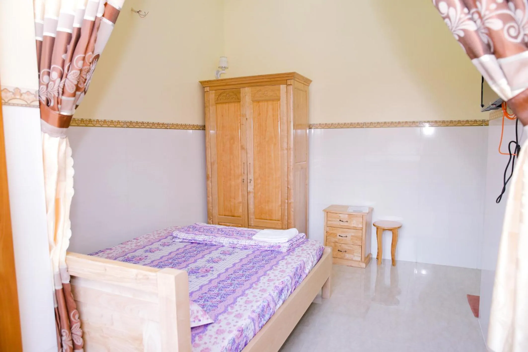 Bed in Nhà Nghỉ Quê Ló